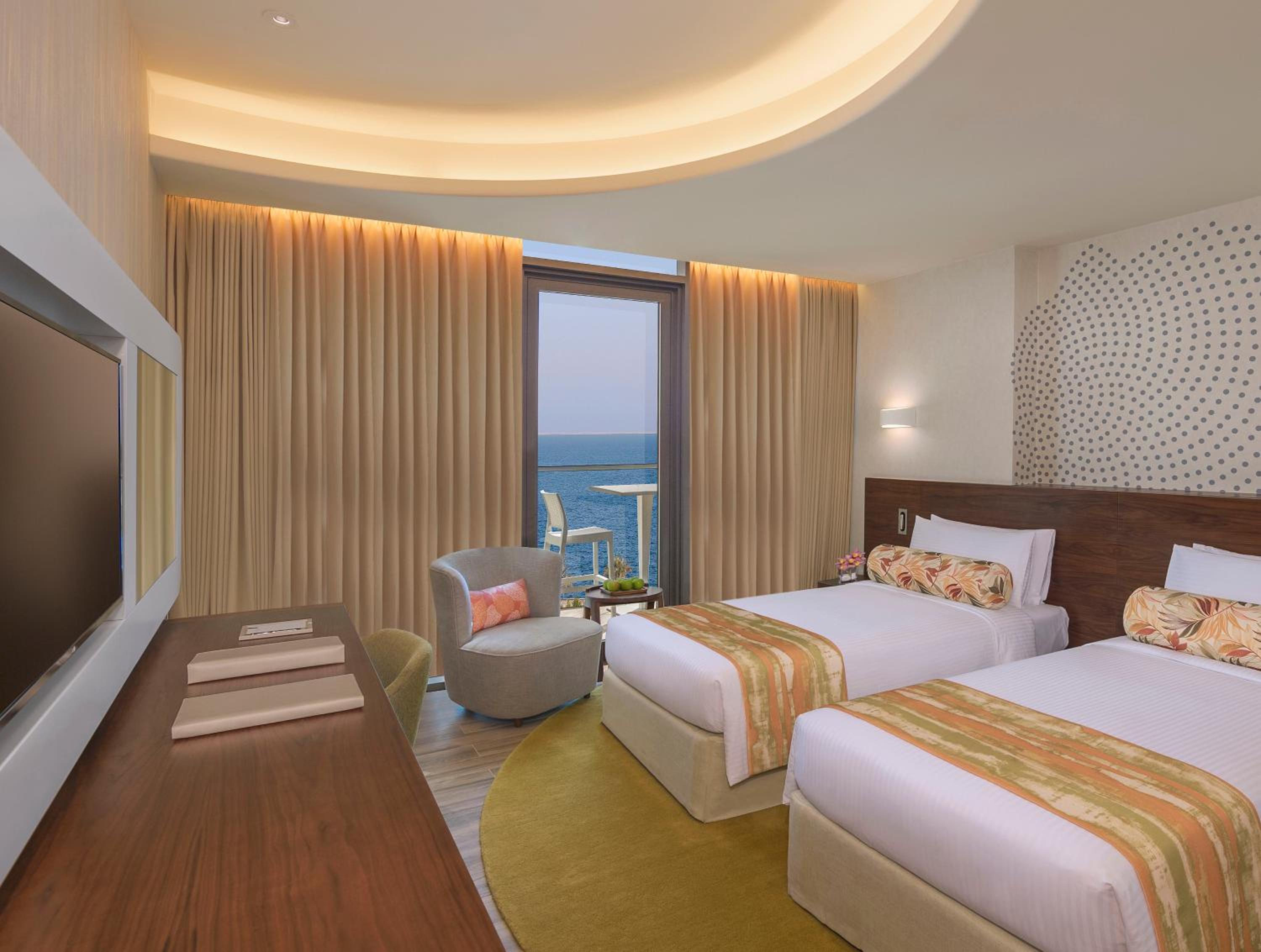 Deluxe Room with Balcony and Partial Sea View