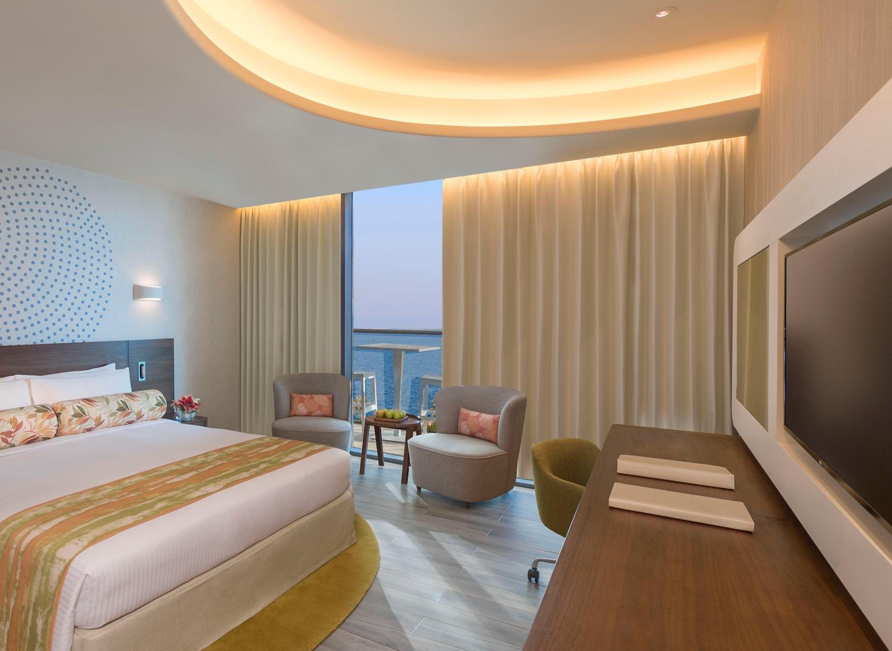 Deluxe Room with Balcony and Partial Sea View