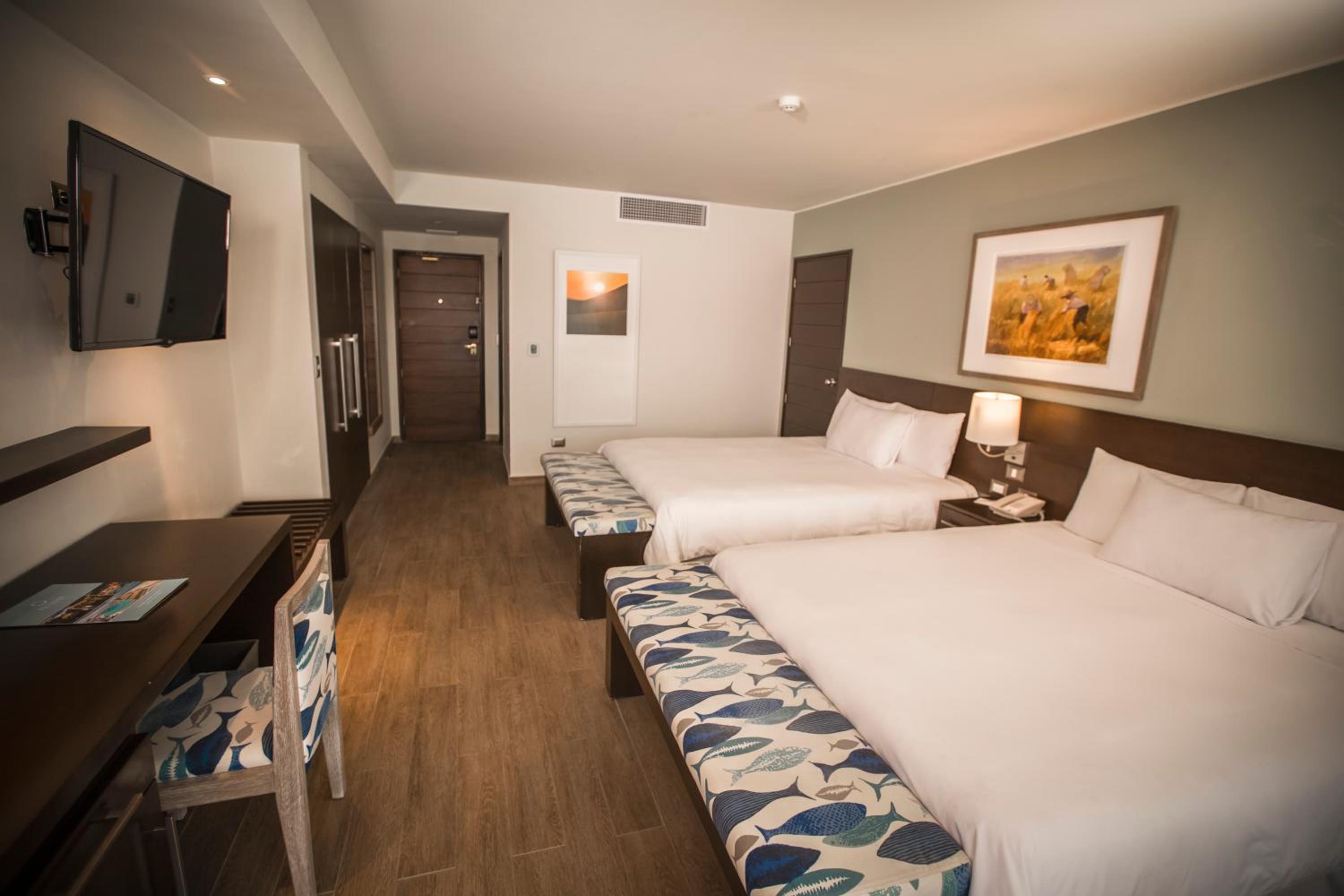 Deluxe Room with Two Queen Beds & Garden View photo 1