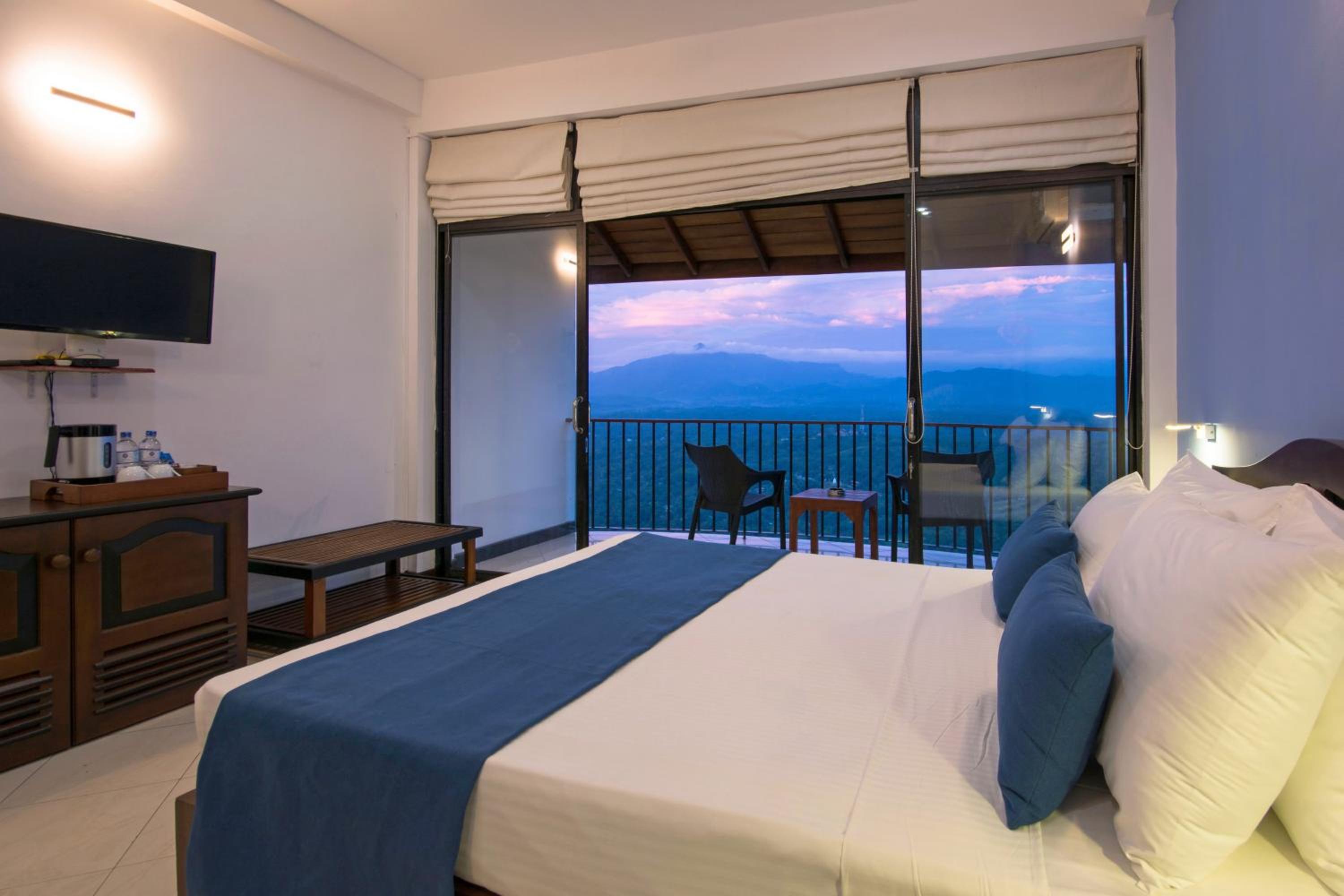 Deluxe Double Room with Balcony with free 24 hours check in & Check out