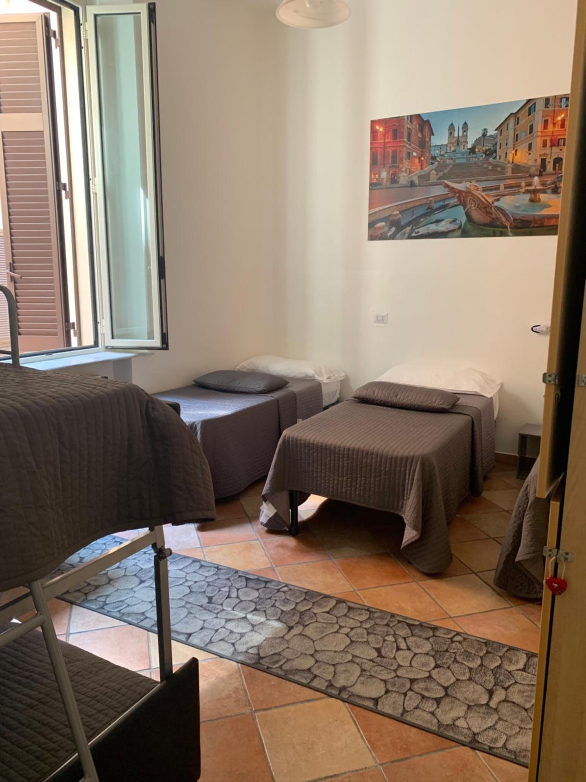 Quadruple Room with Outside Private Bathroom photo 2