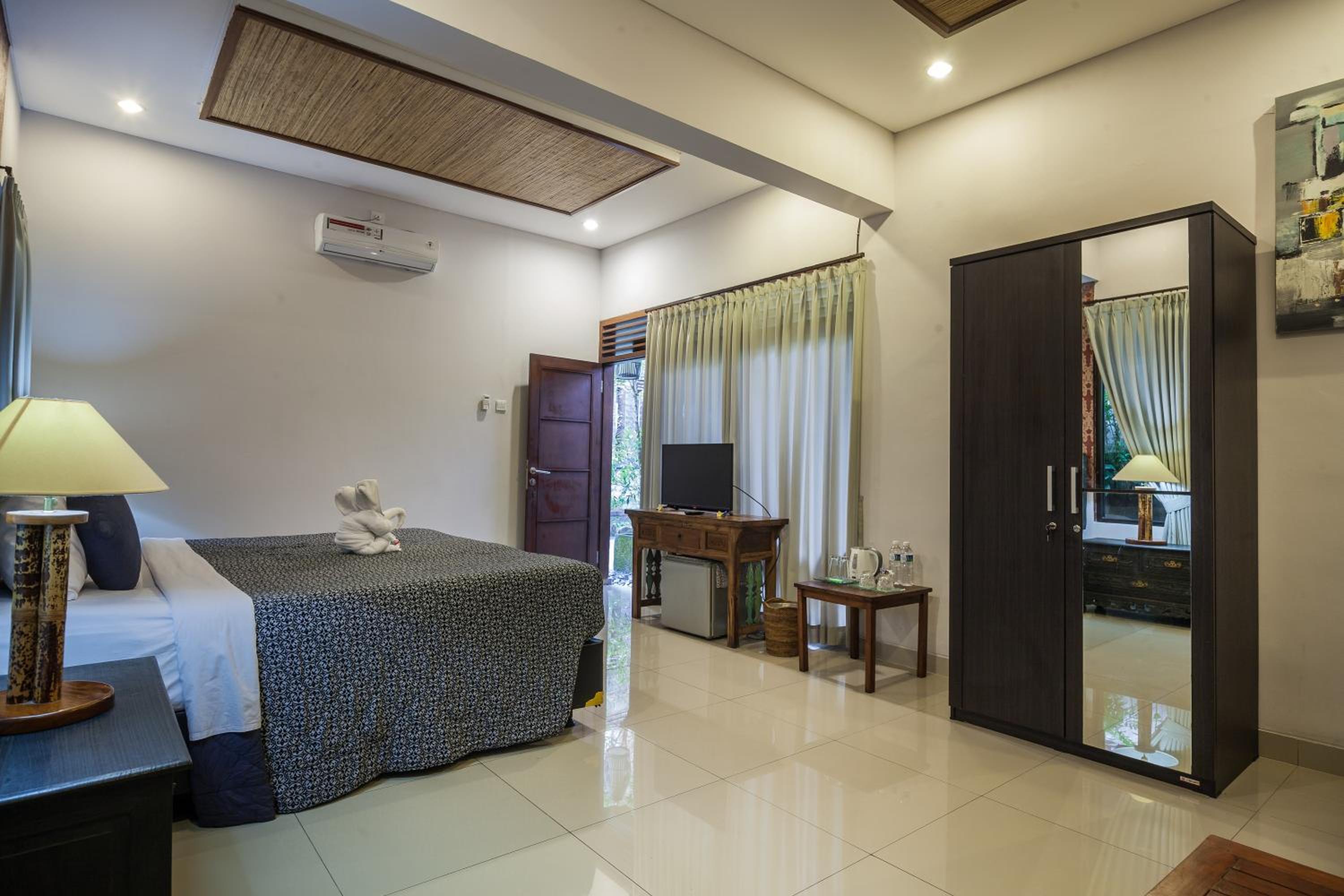 Deluxe Room with Garden View - Photo 8