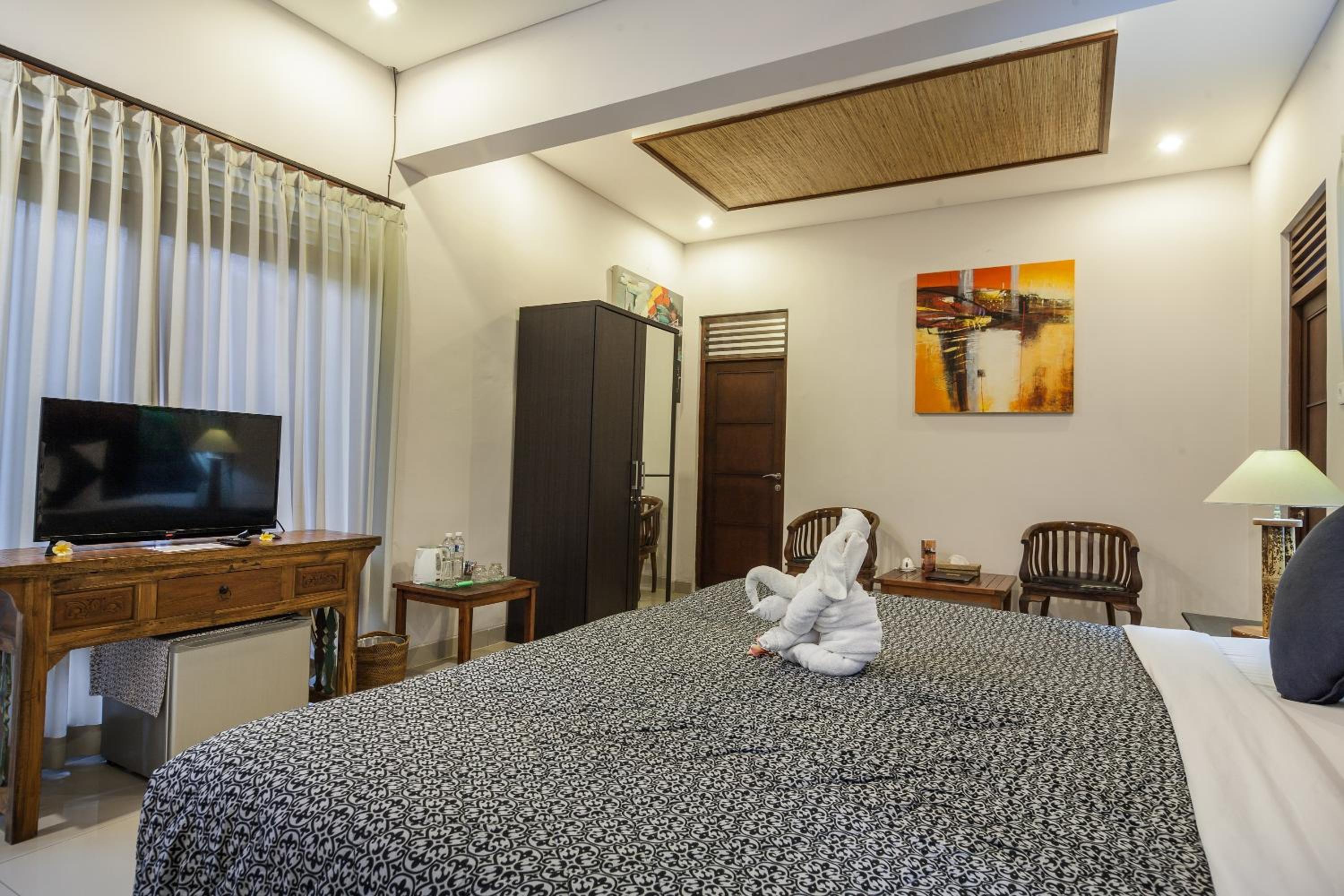 Deluxe Room with Garden View - Photo 9