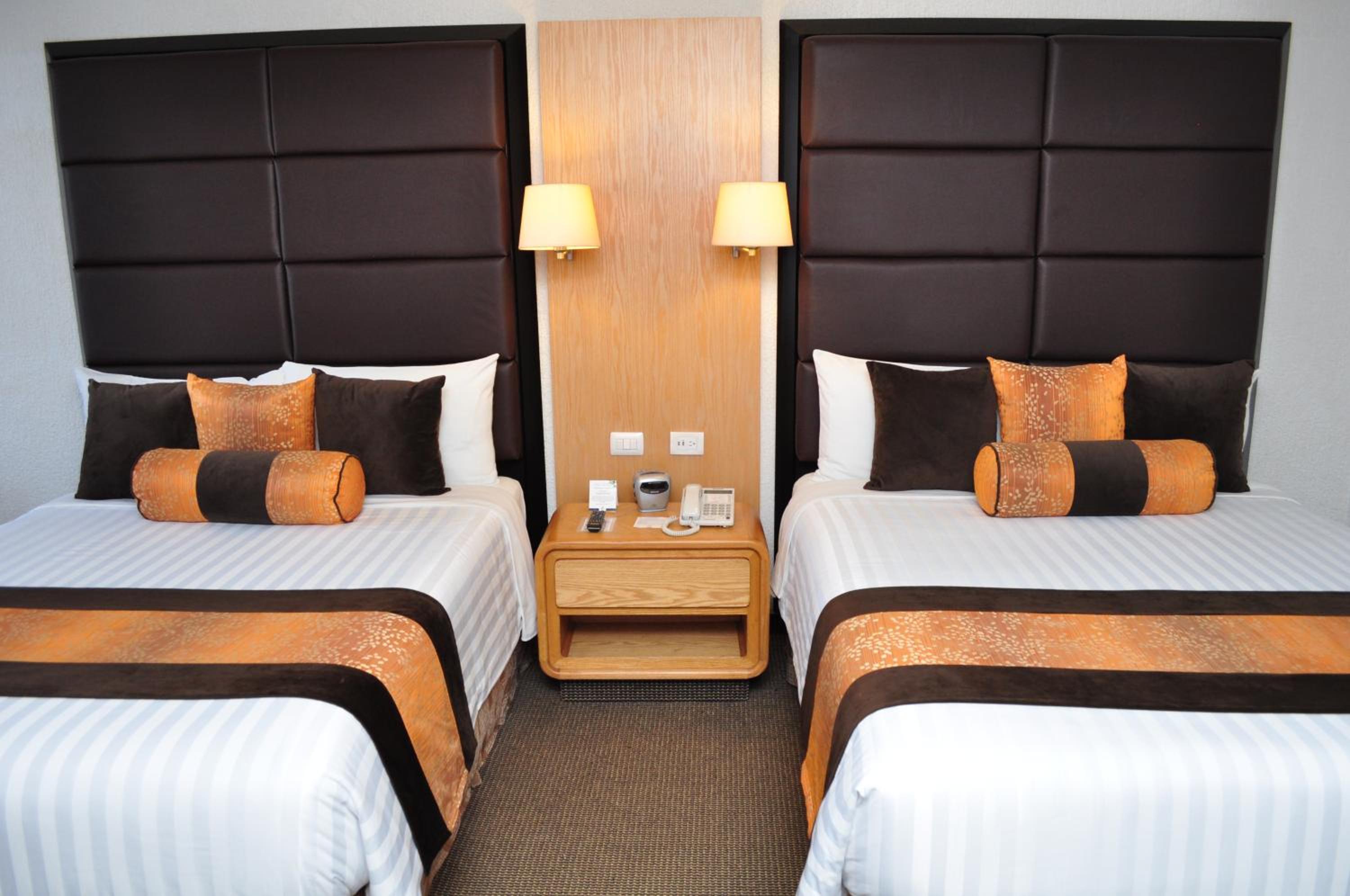 Queen Room with Two Queen Beds - Photo 1