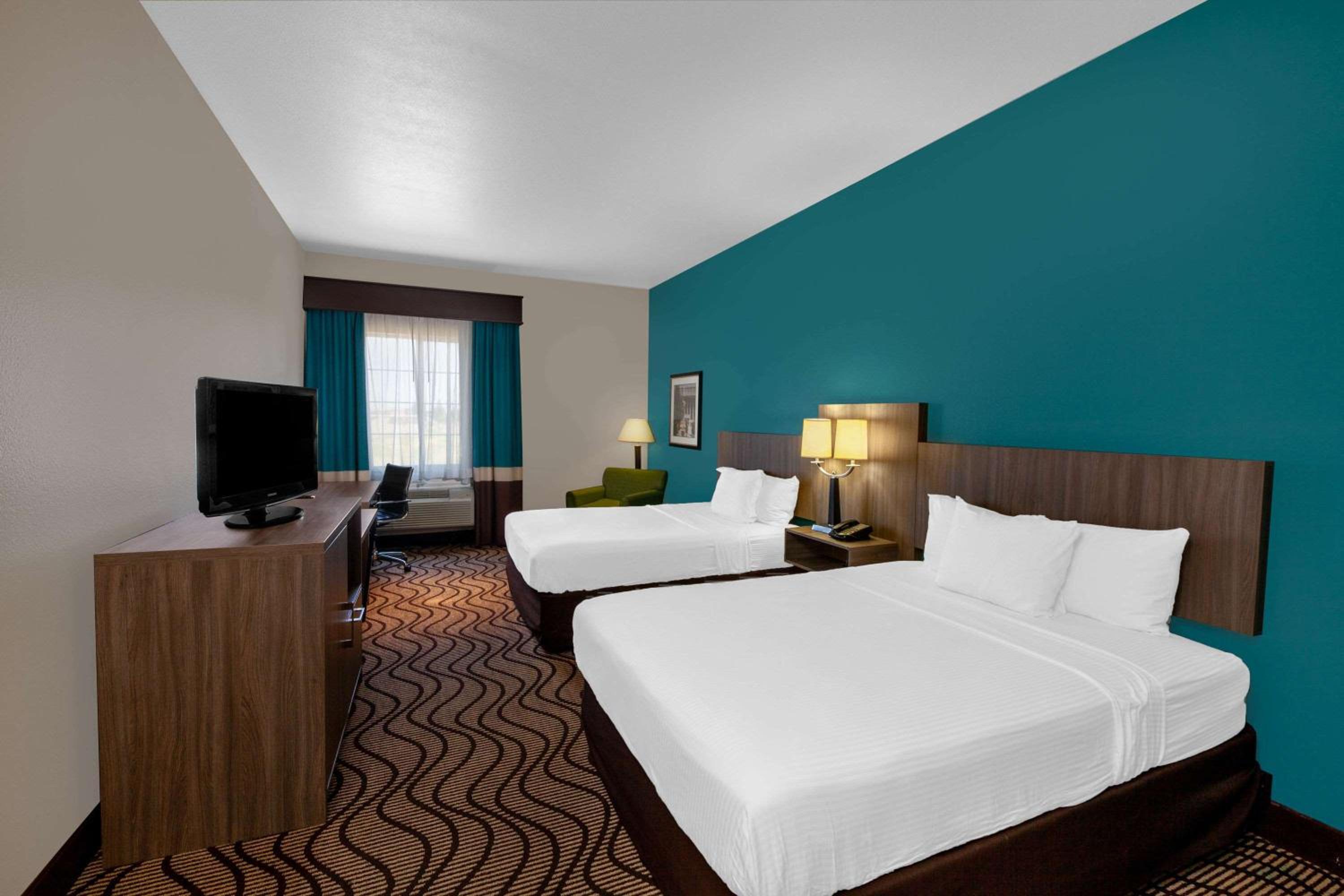 Deluxe Queen Room with Two Queen Beds - Photo 1