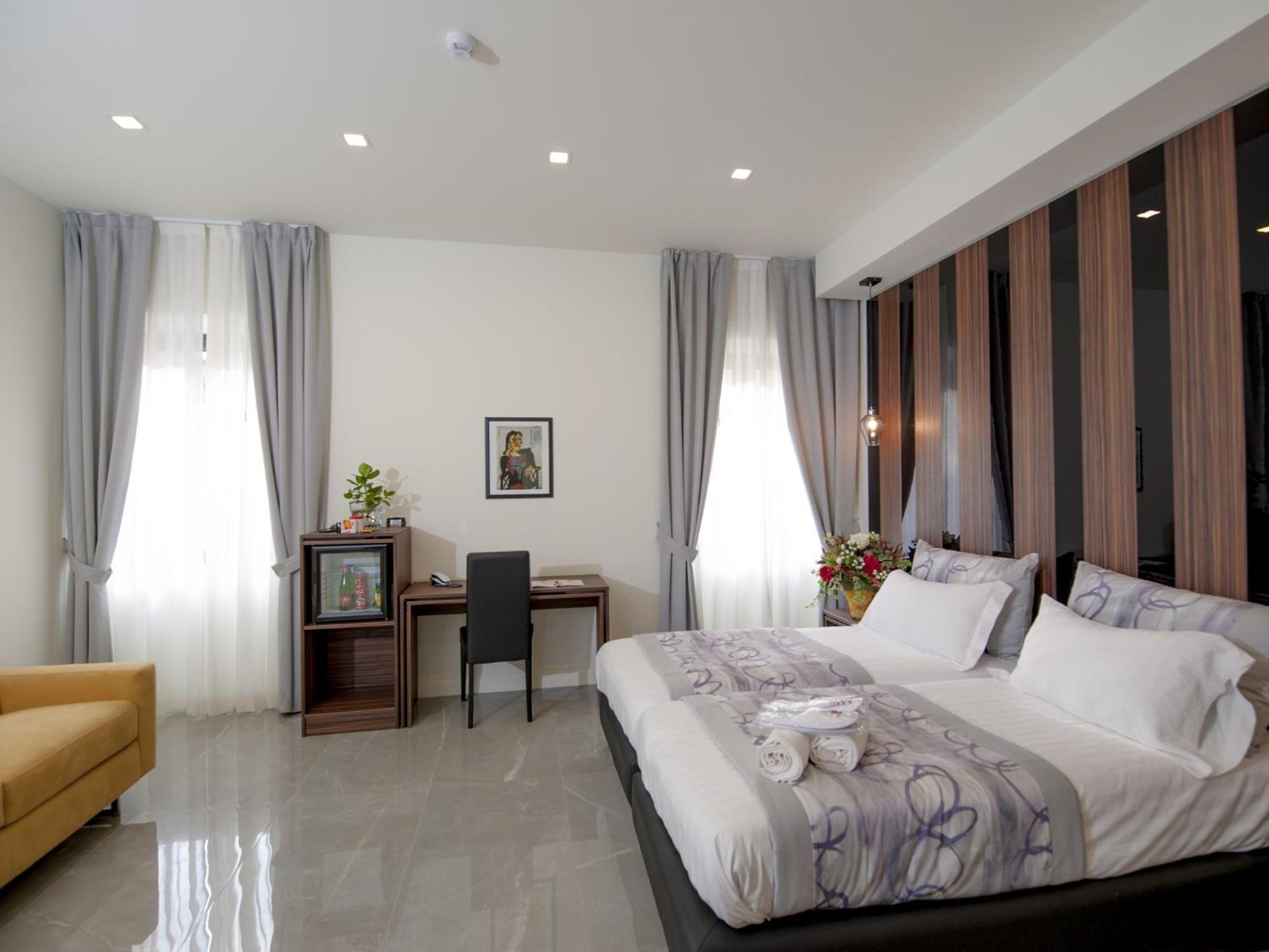 Quadruple Room - Photo 1