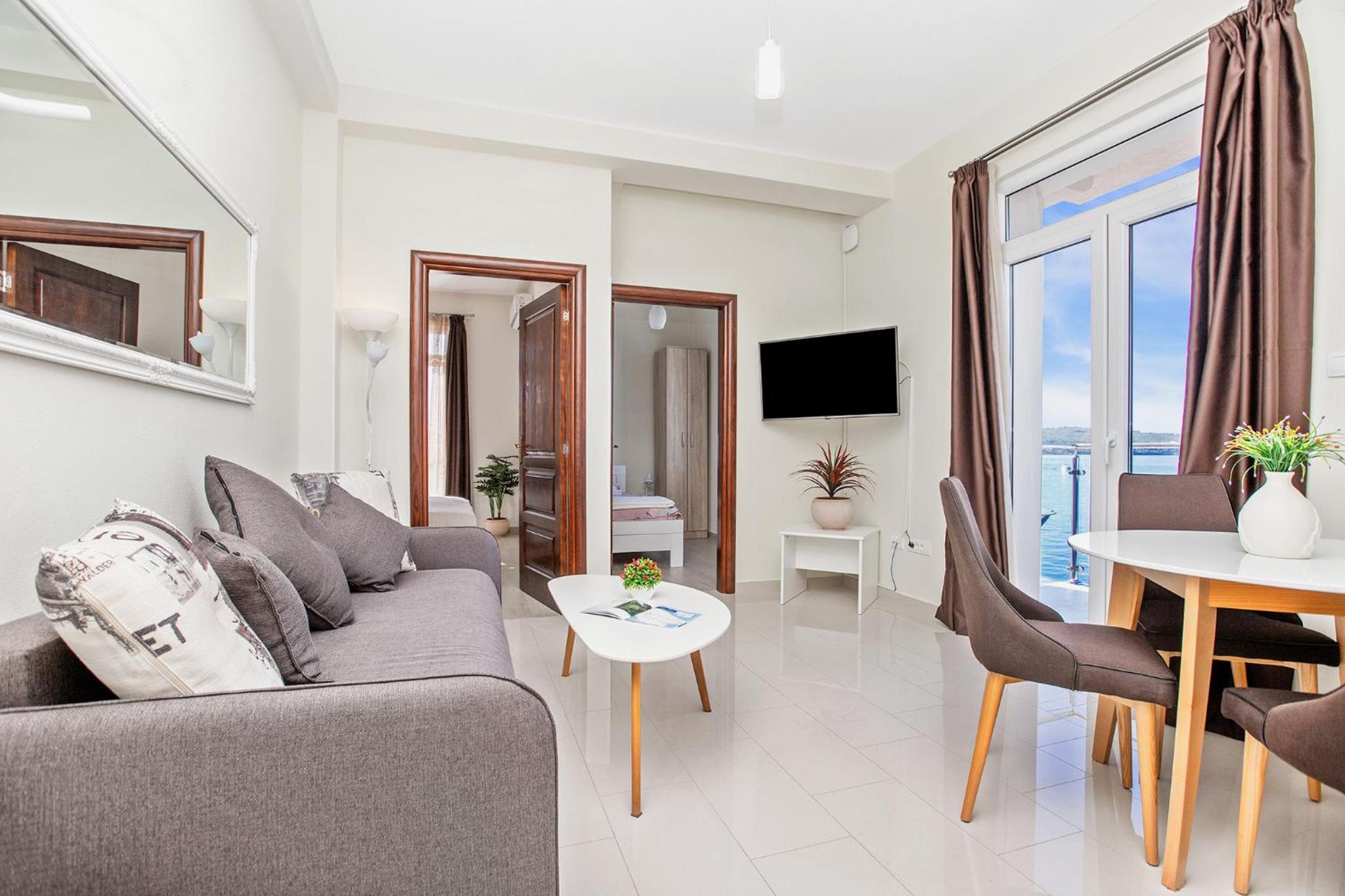 Two-Bedroom Apartment with Balcony and Sea View