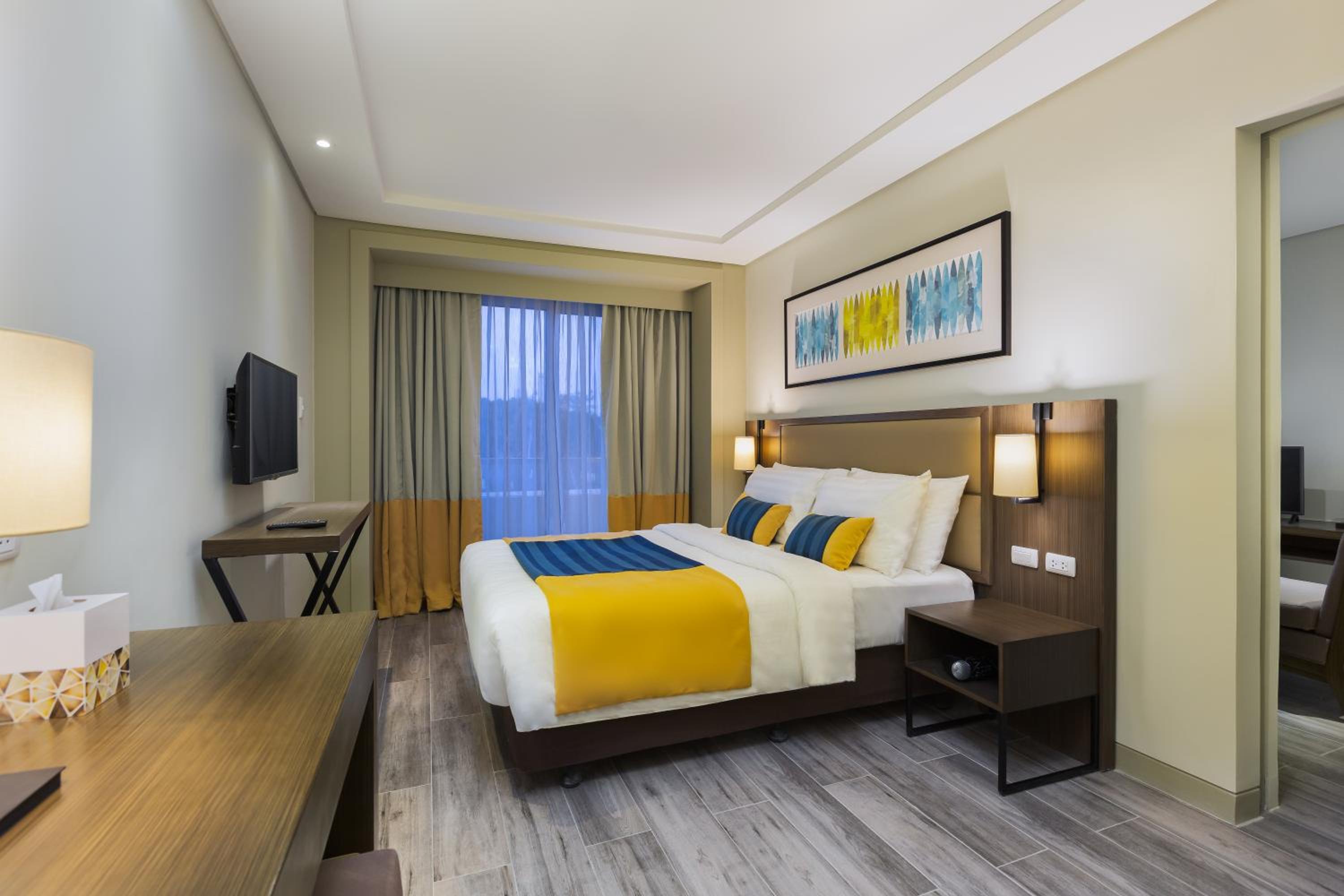 One Bedroom Executive Suite with Living Room - Photo 1