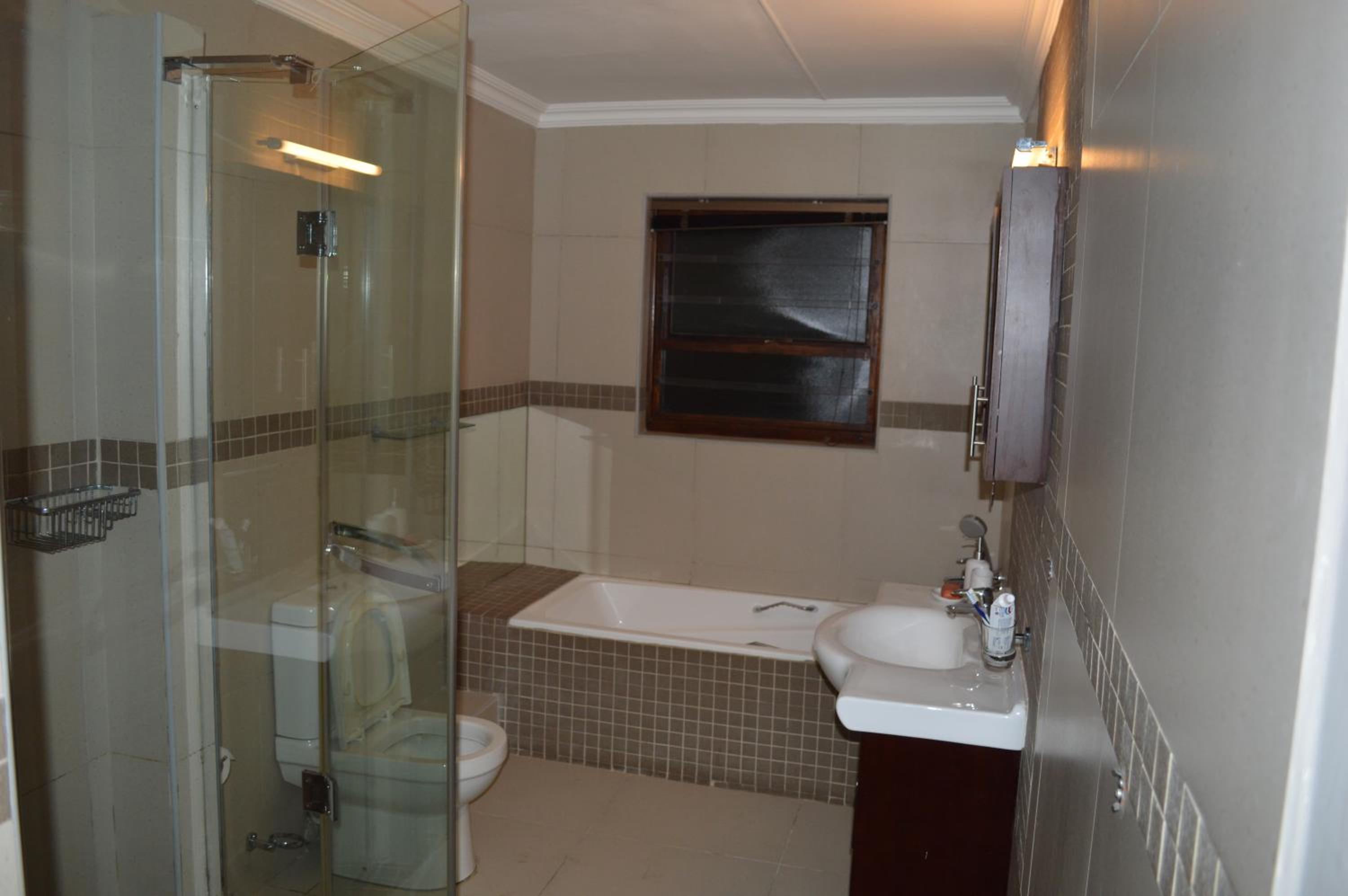 Three-Bedroom House - Photo 10