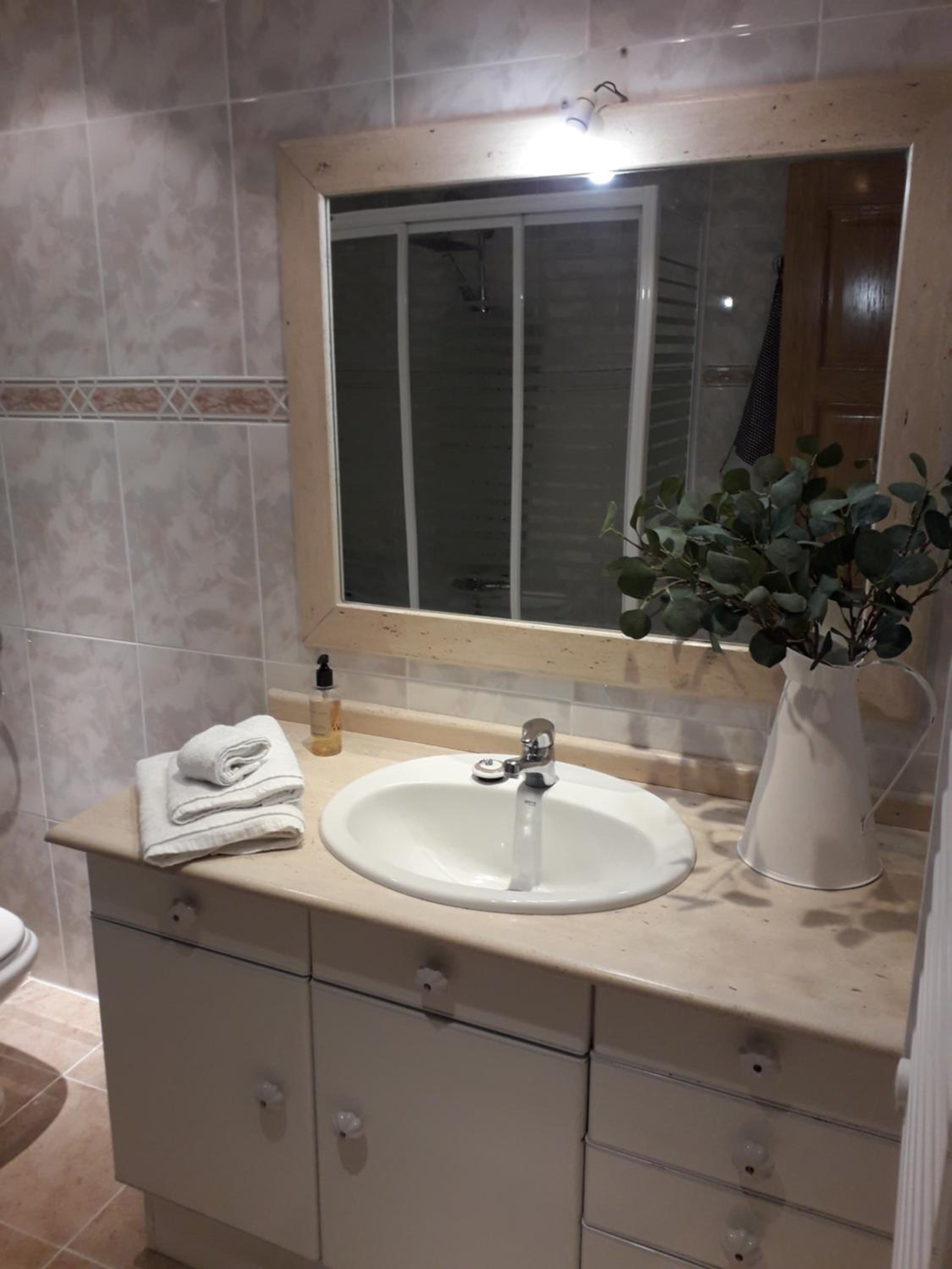 Three-Bedroom Apartment - Photo 40