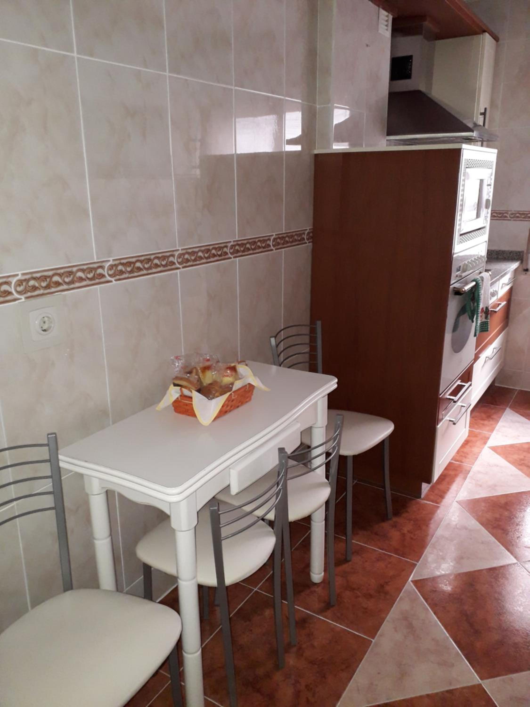 Three-Bedroom Apartment - Photo 32