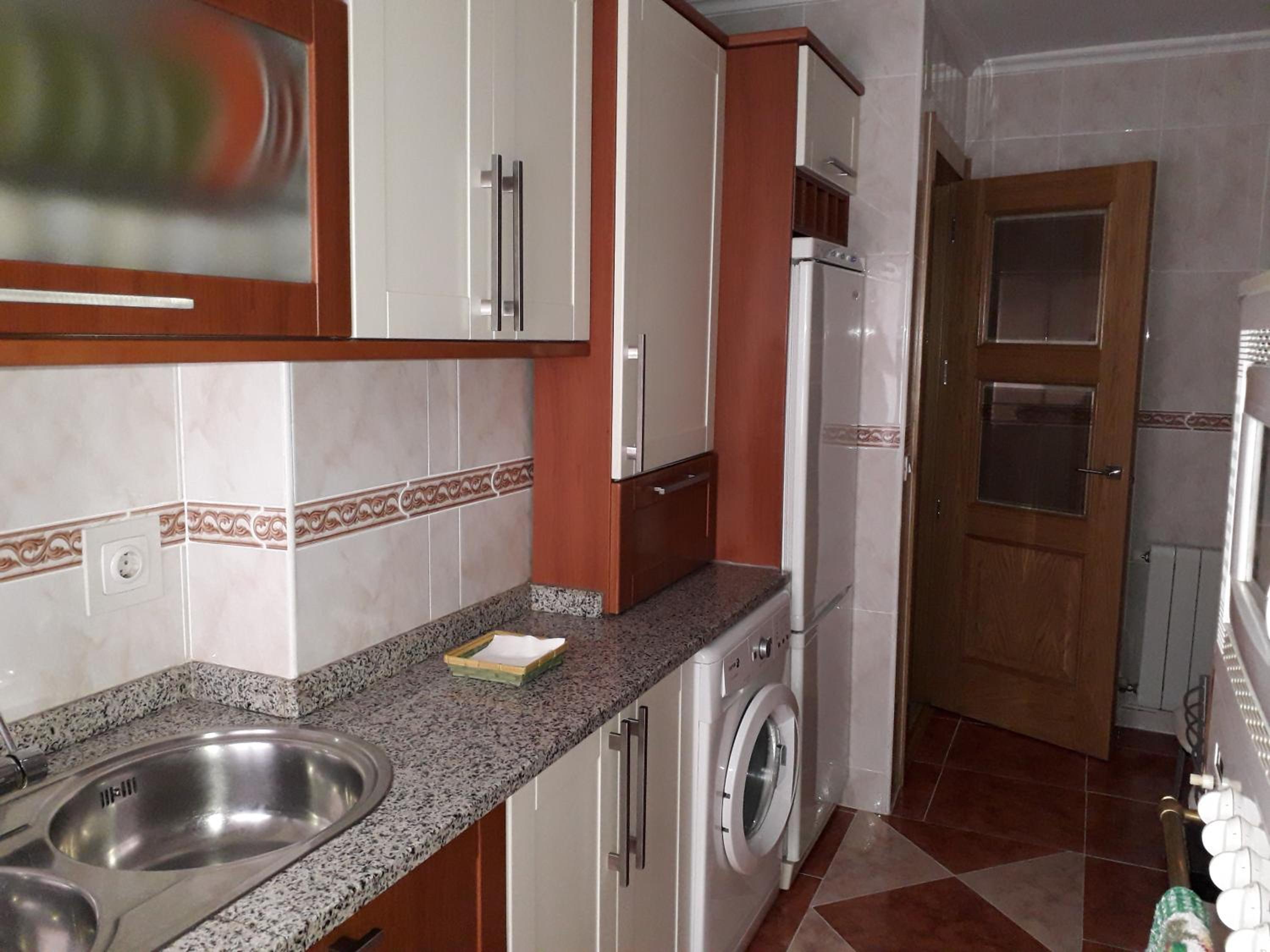 Three-Bedroom Apartment - Photo 31