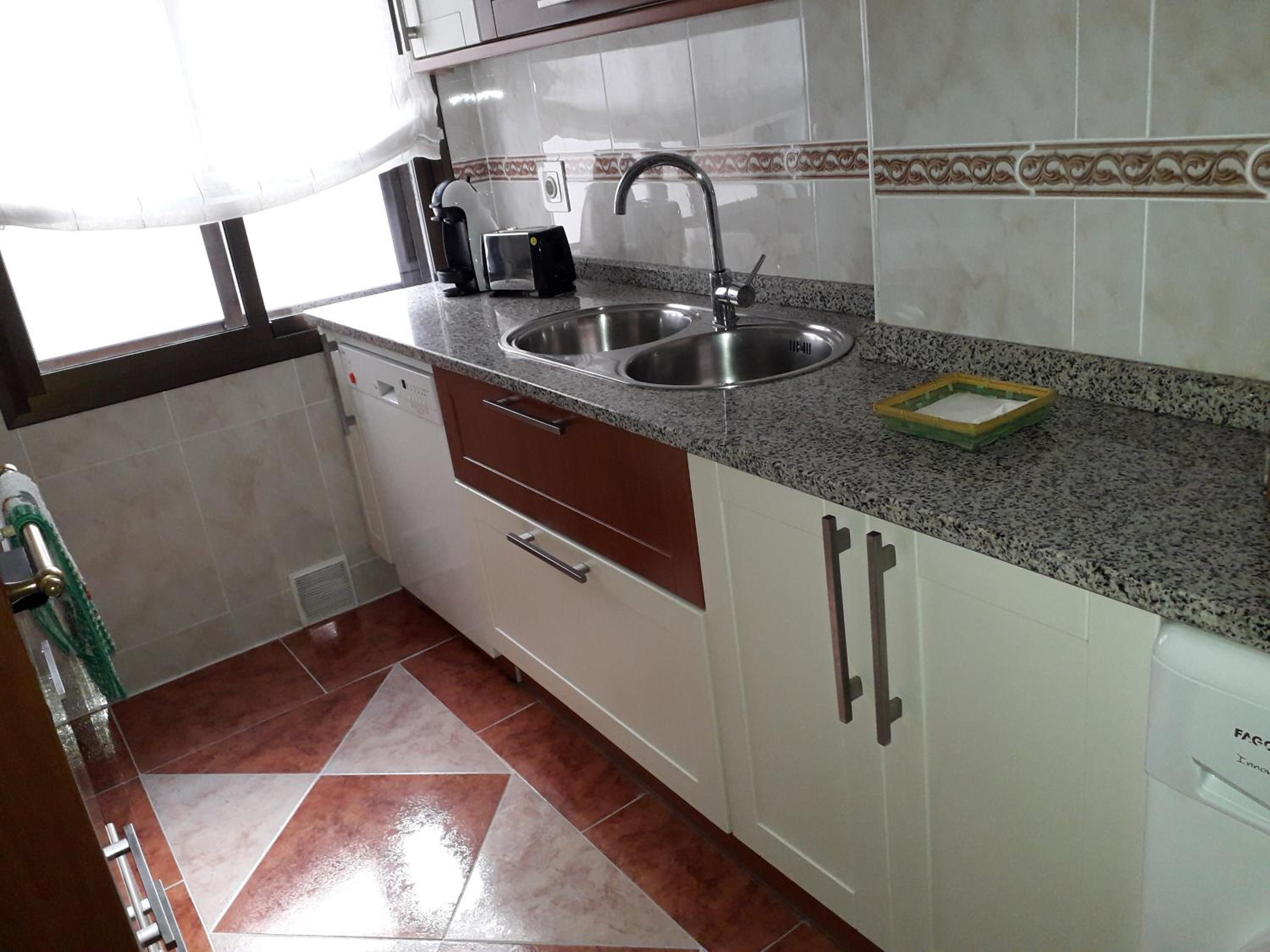Three-Bedroom Apartment - Photo 12