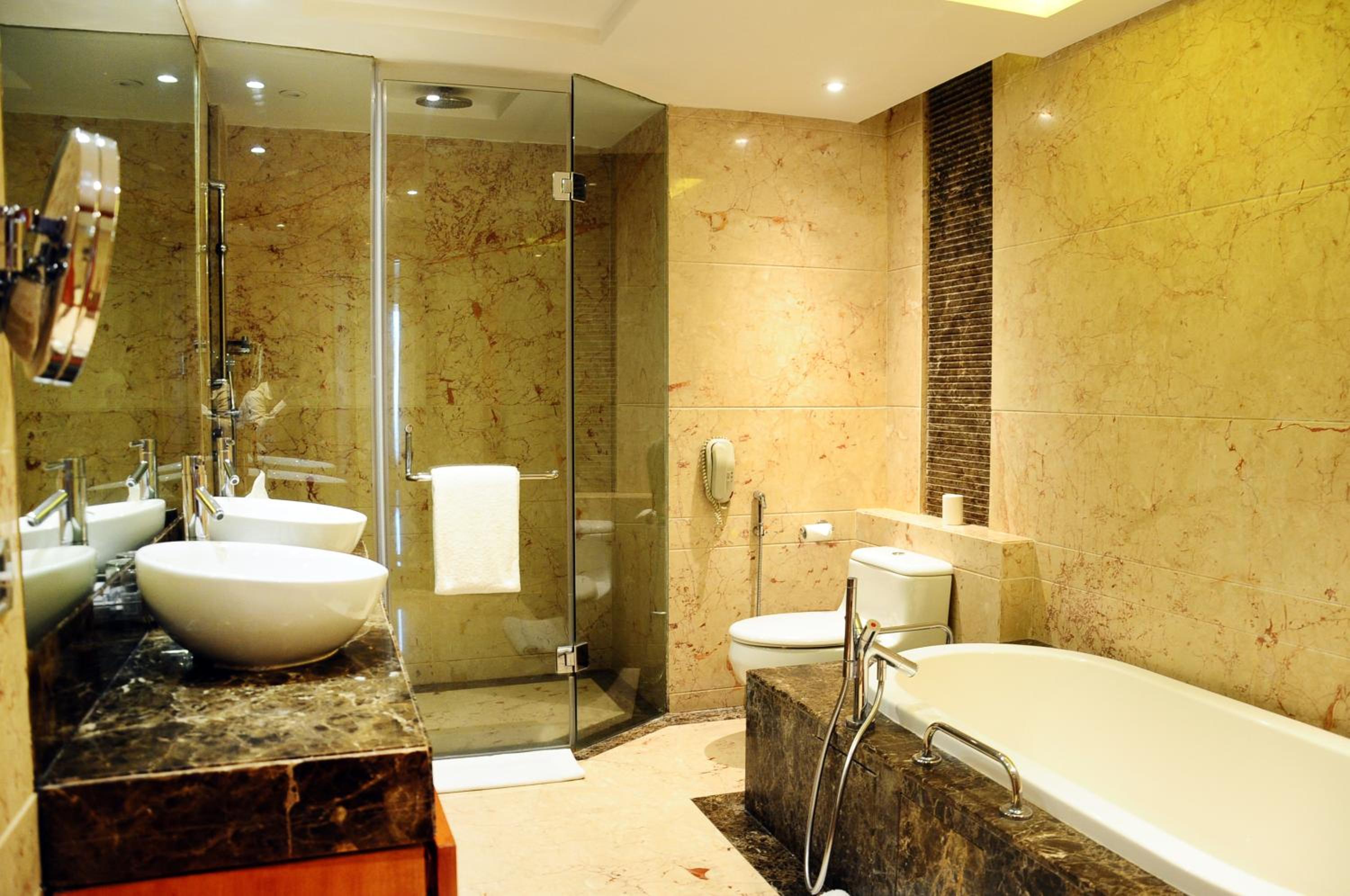Deluxe Suite with Happy Hours 01:00 PM to 06:00 PM 1+1, Airport Transfers, 20% Discount on Food & Beverage and Free Pick up and drop to Worldmark Aerocity (subject to car availability)
