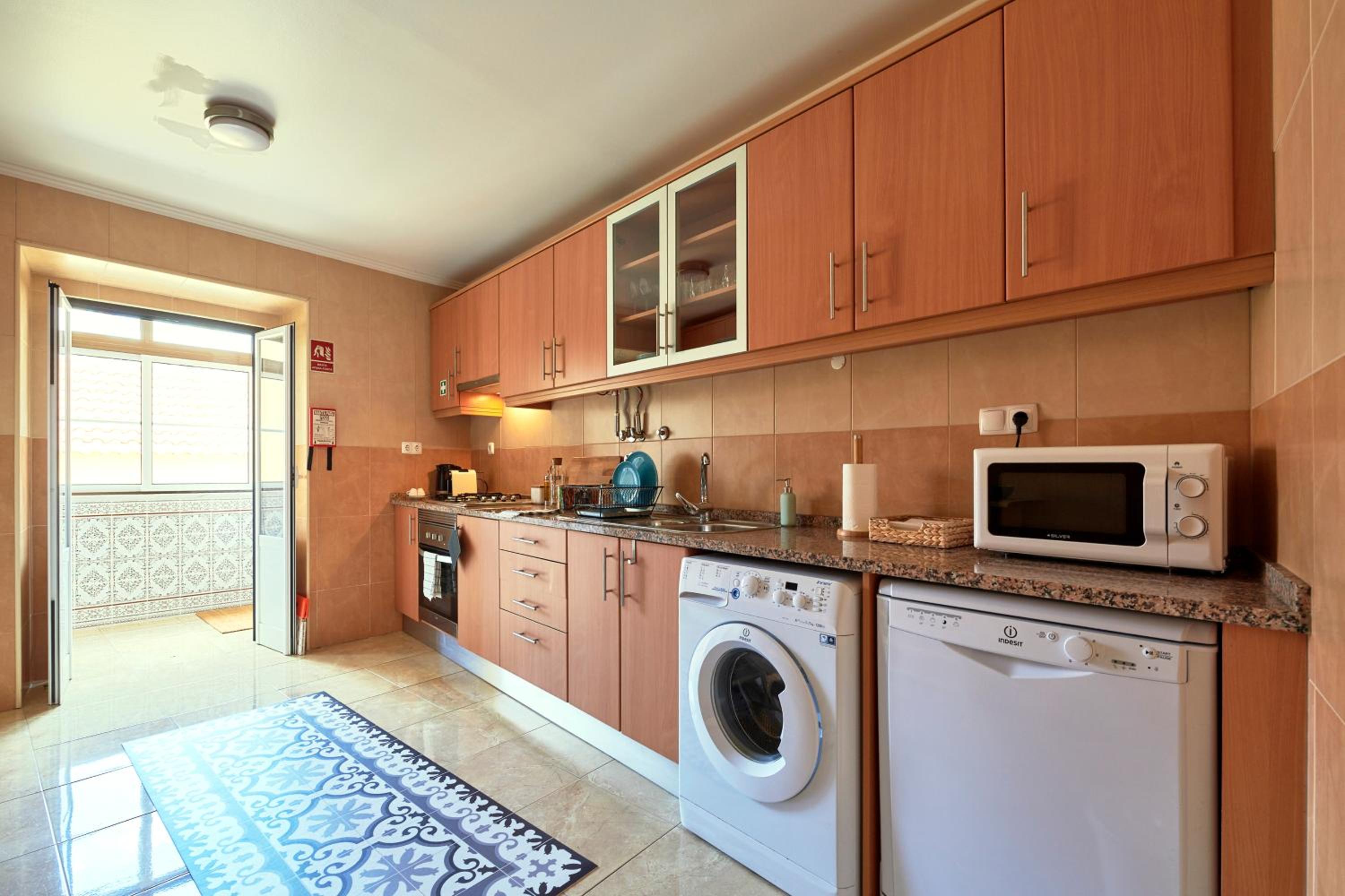 Three-Bedroom Apartment - Photo 28