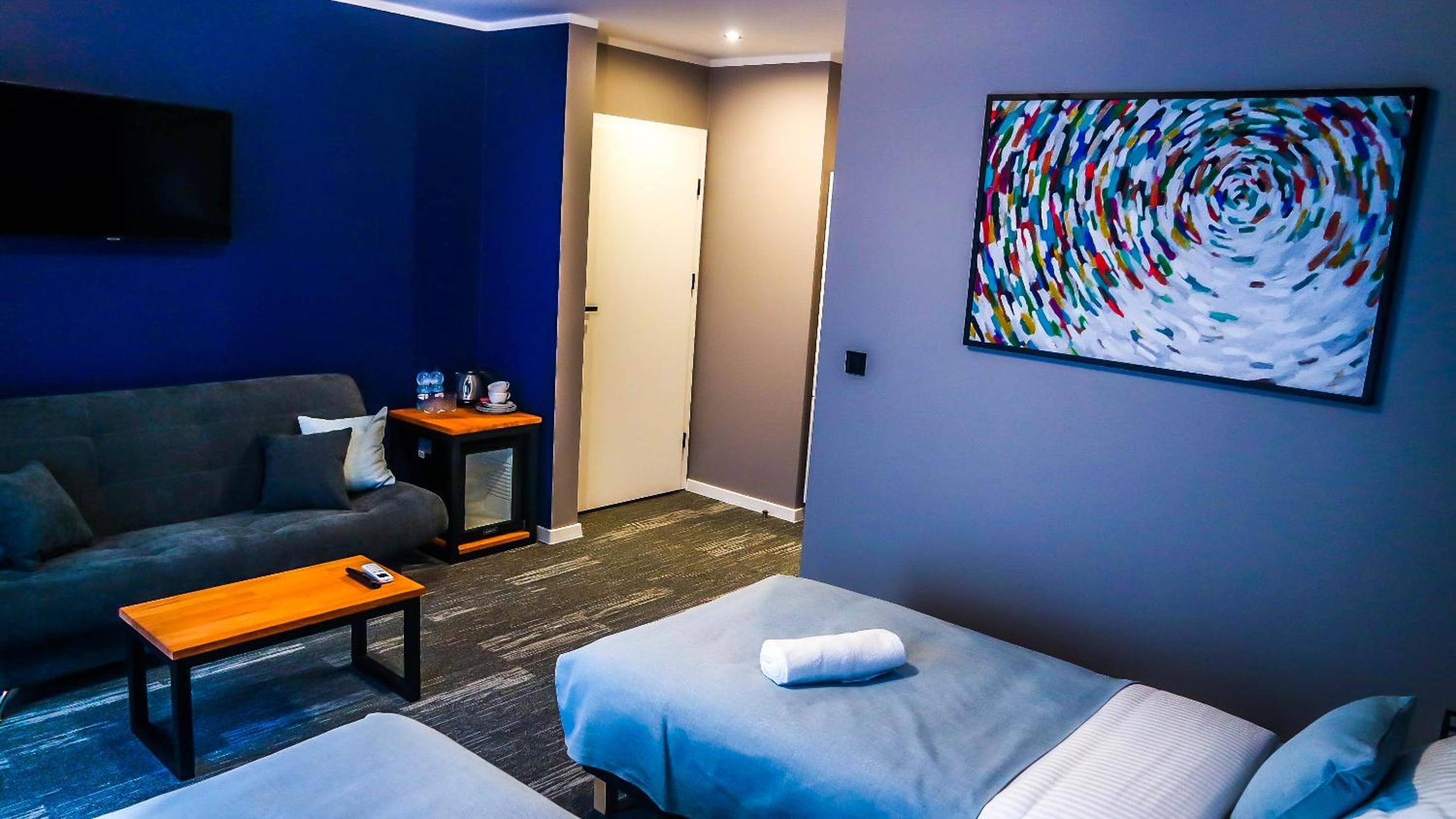 Deluxe Triple Room - Photo 1