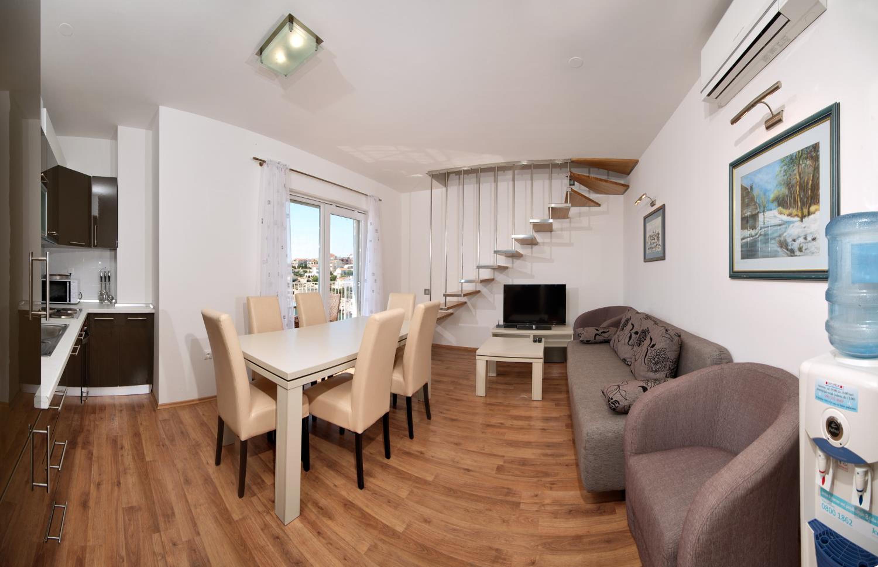 Duplex Three-Bedroom Apartment with Balcony and Sea View photo 1