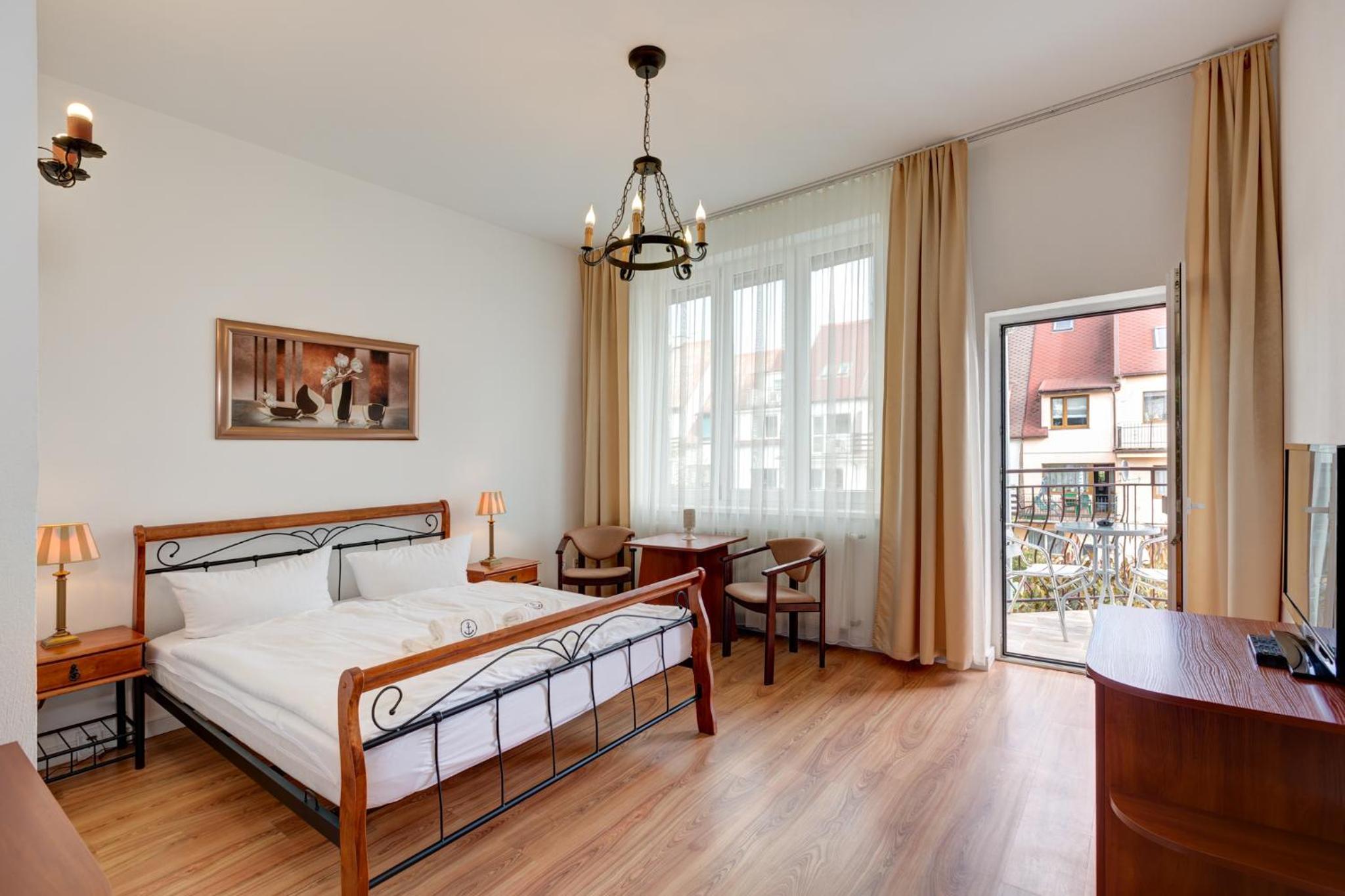 Deluxe Double Room with Balcony - Photo 1