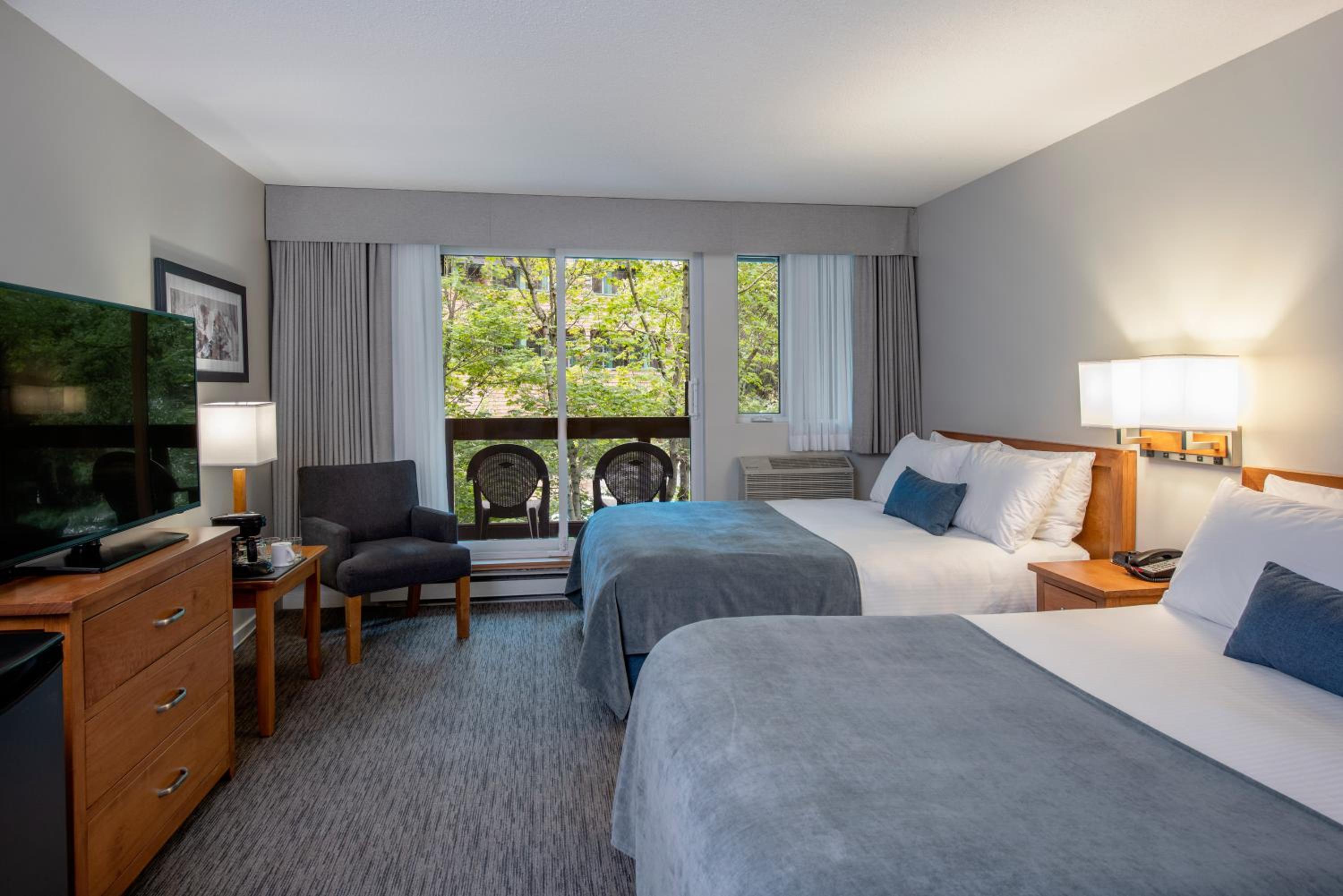 Standard Queen Room with Two Queen Beds - Photo 1