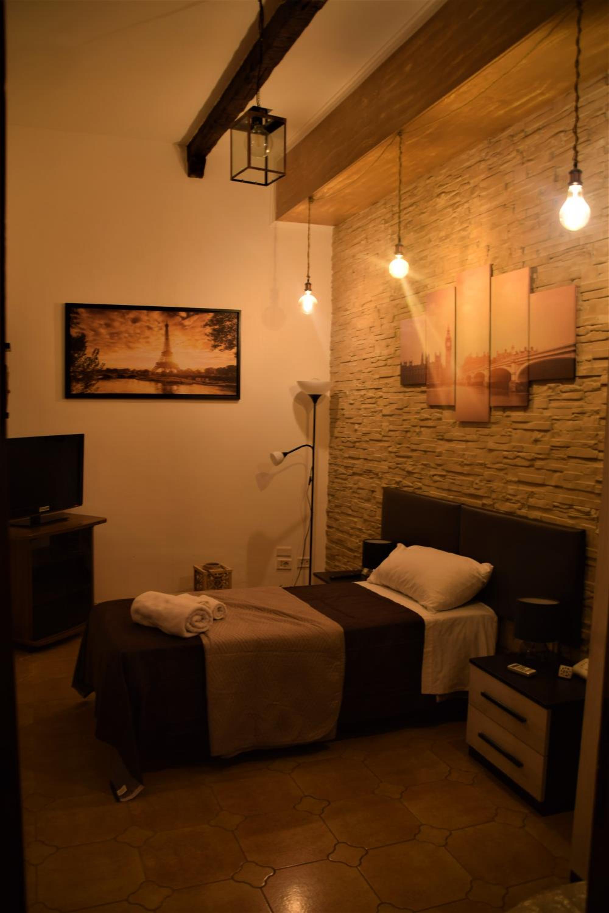 Three-Bedroom Apartment - Photo 6