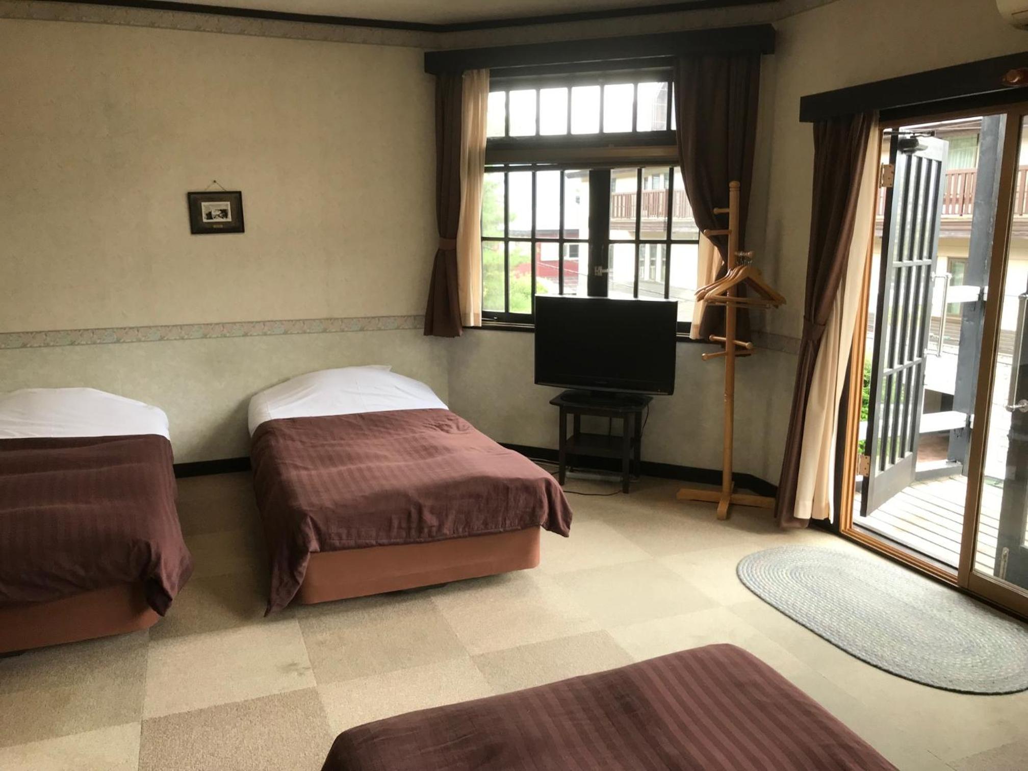 Quadruple Room with Balcony
