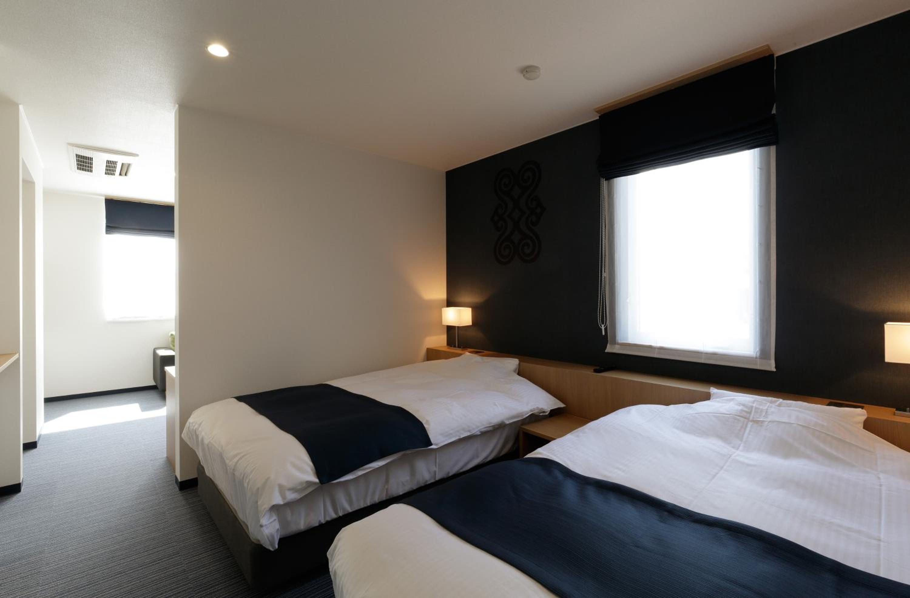 Deluxe Twin Room - Photo 1