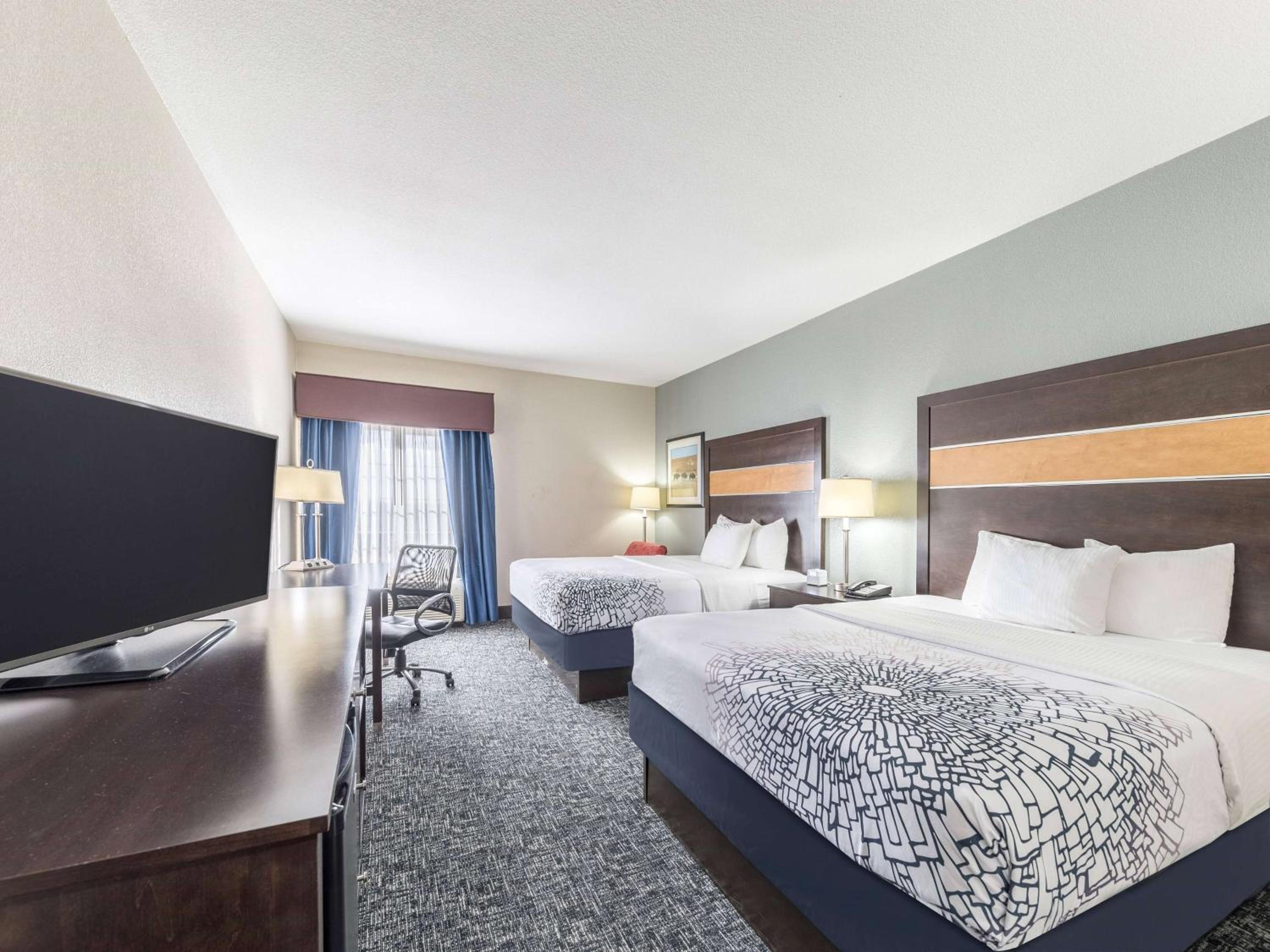 Deluxe Queen Room with Two Queen Beds - Photo 1