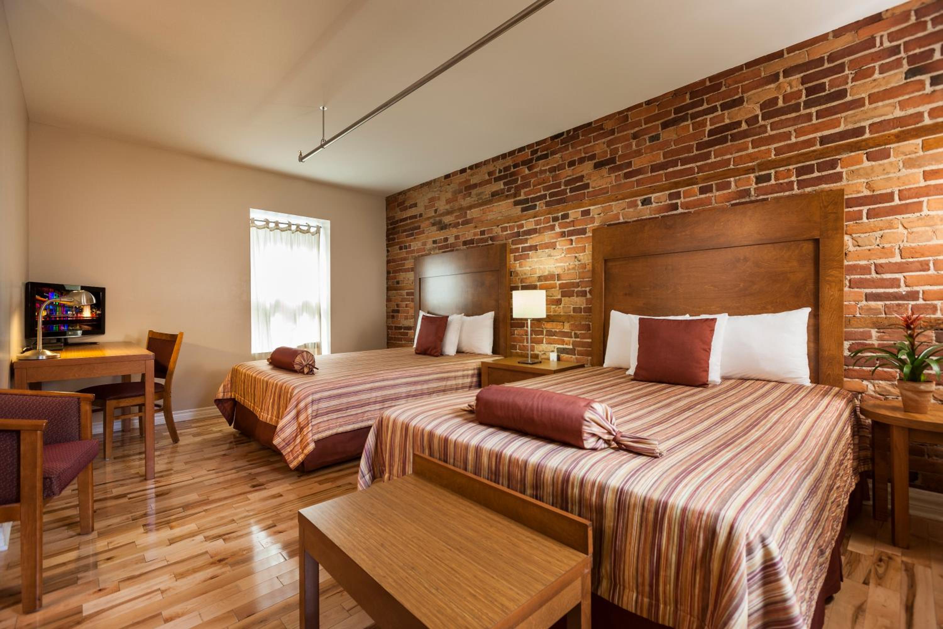 Superior Queen Room with Two Queen Beds - Photo 1