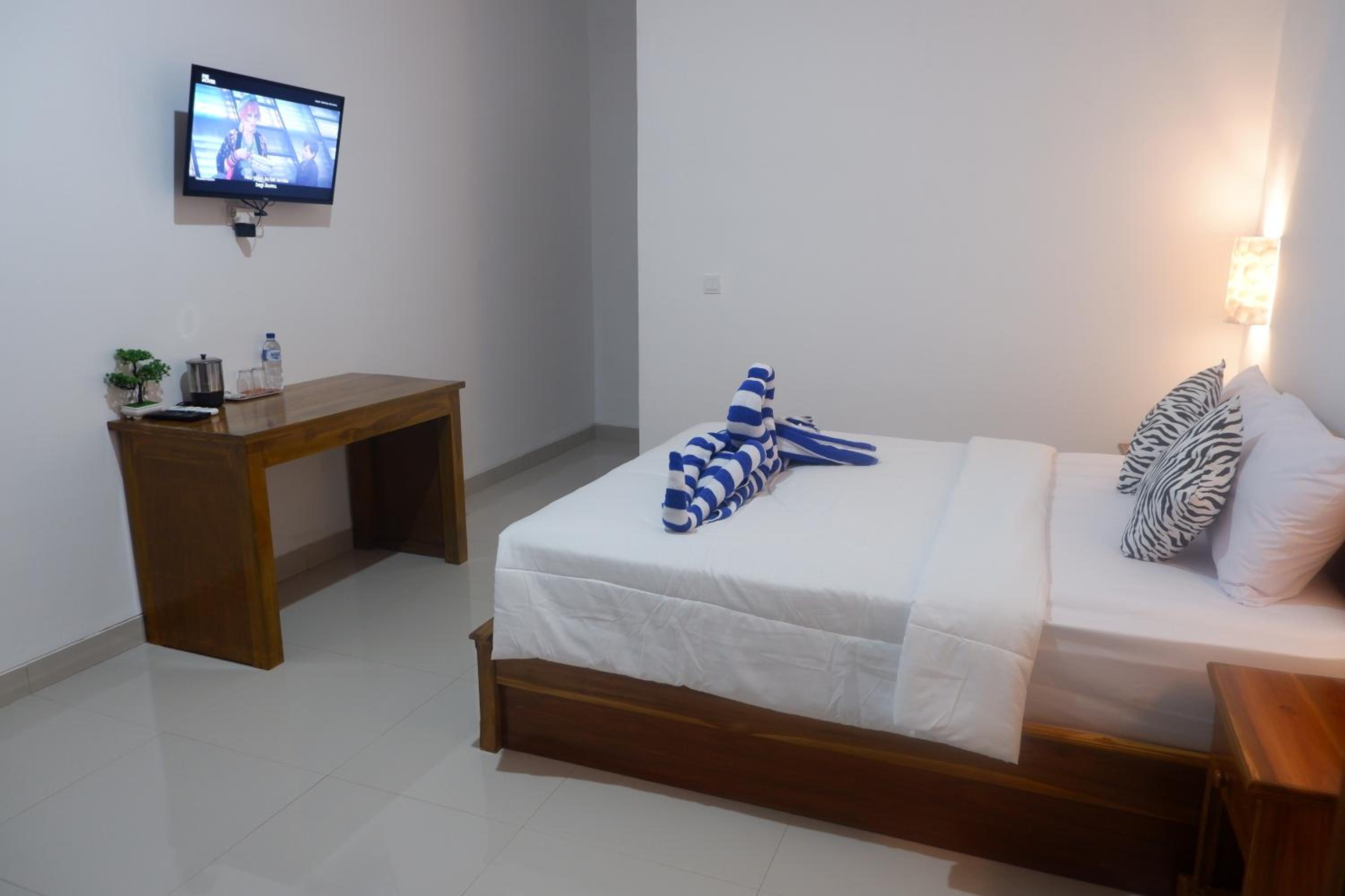 Deluxe Room - Photo 29