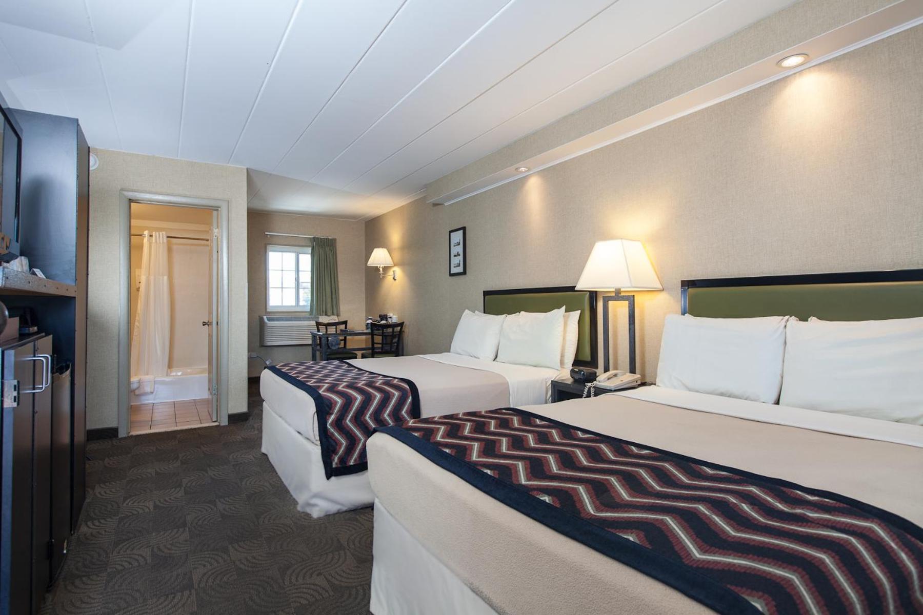 Queen Room with Two Queen Beds - Photo 1