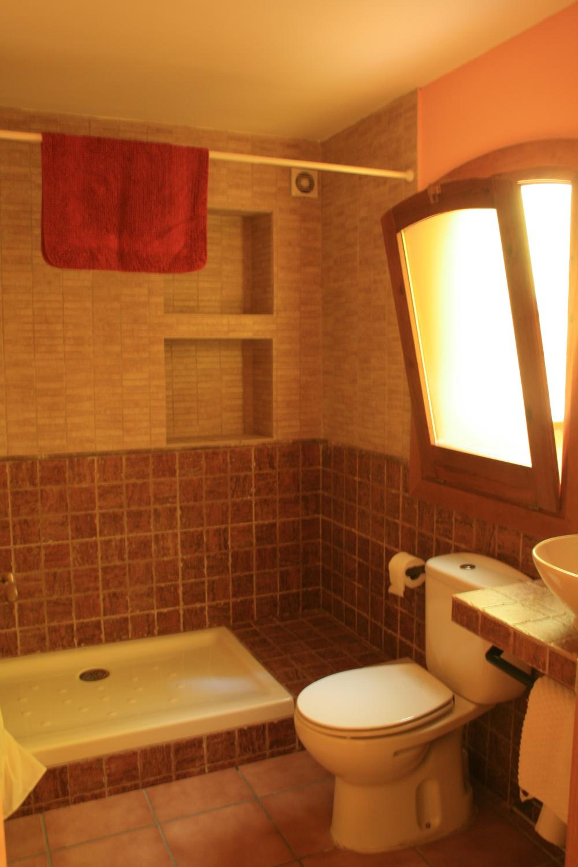 Four-Bedroom House - Photo 32