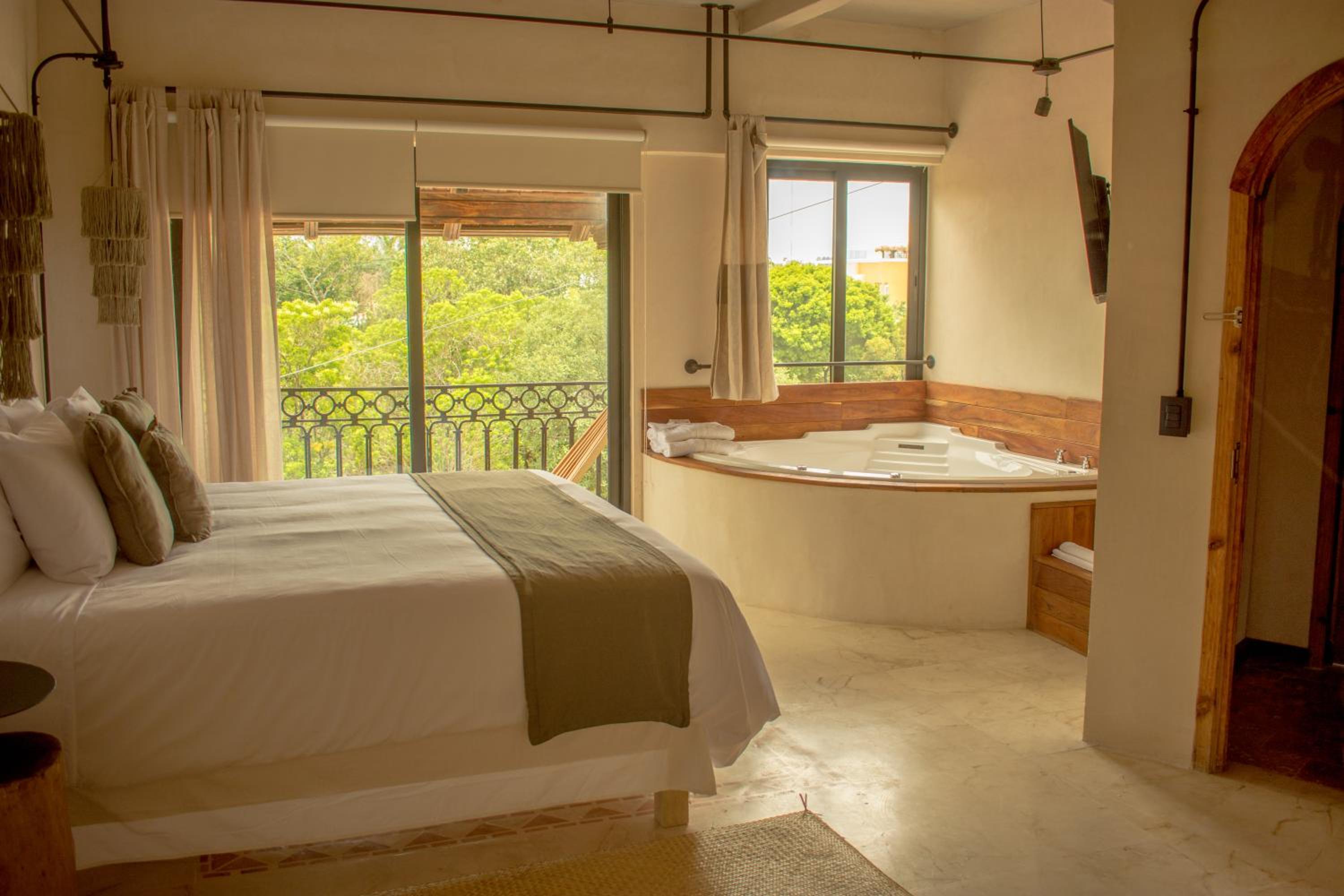 Master Suite with Jacuzzi, Balcony and City Views - Photo 1