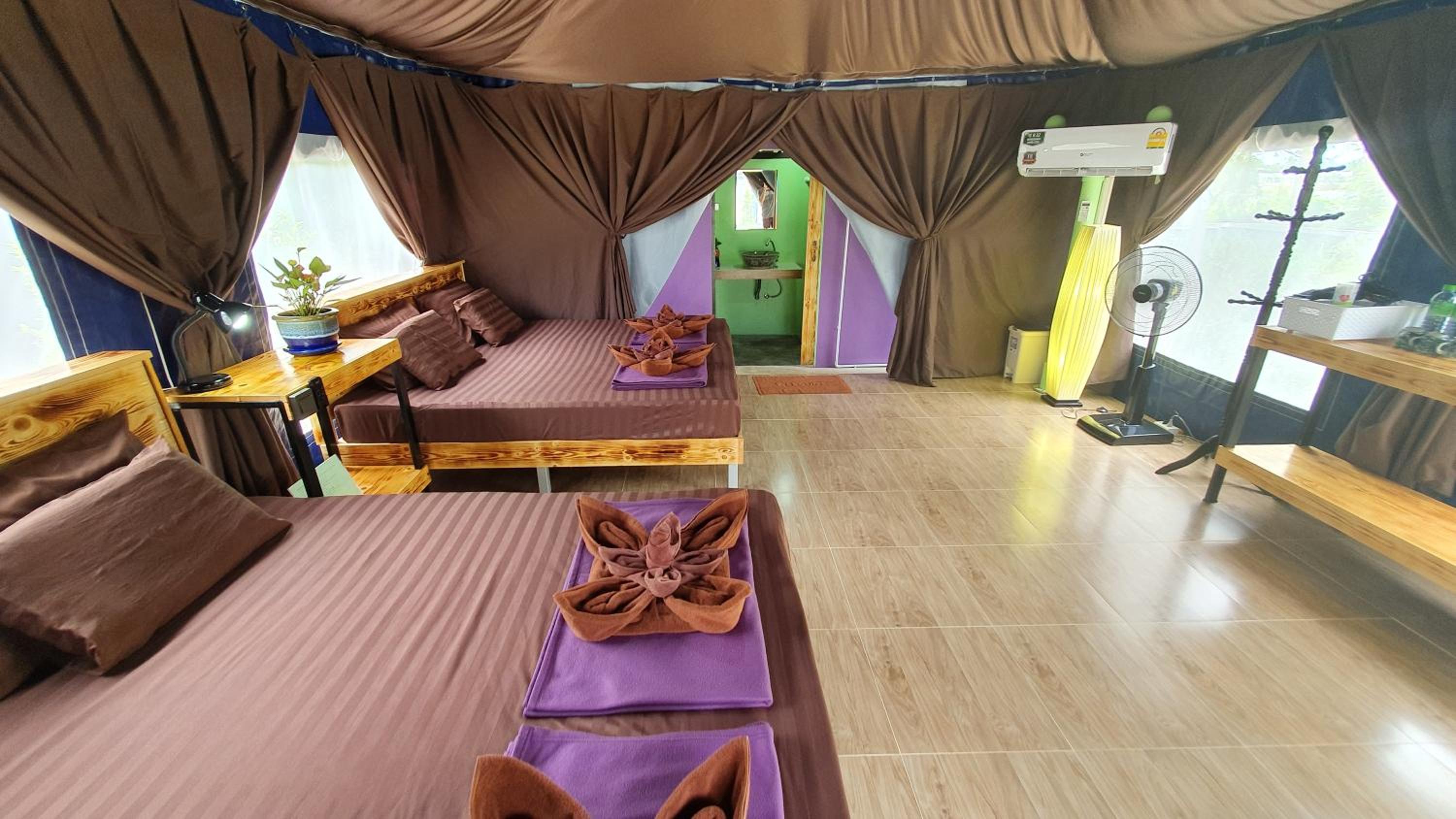 Deluxe Quadruple Room - Photo 13
