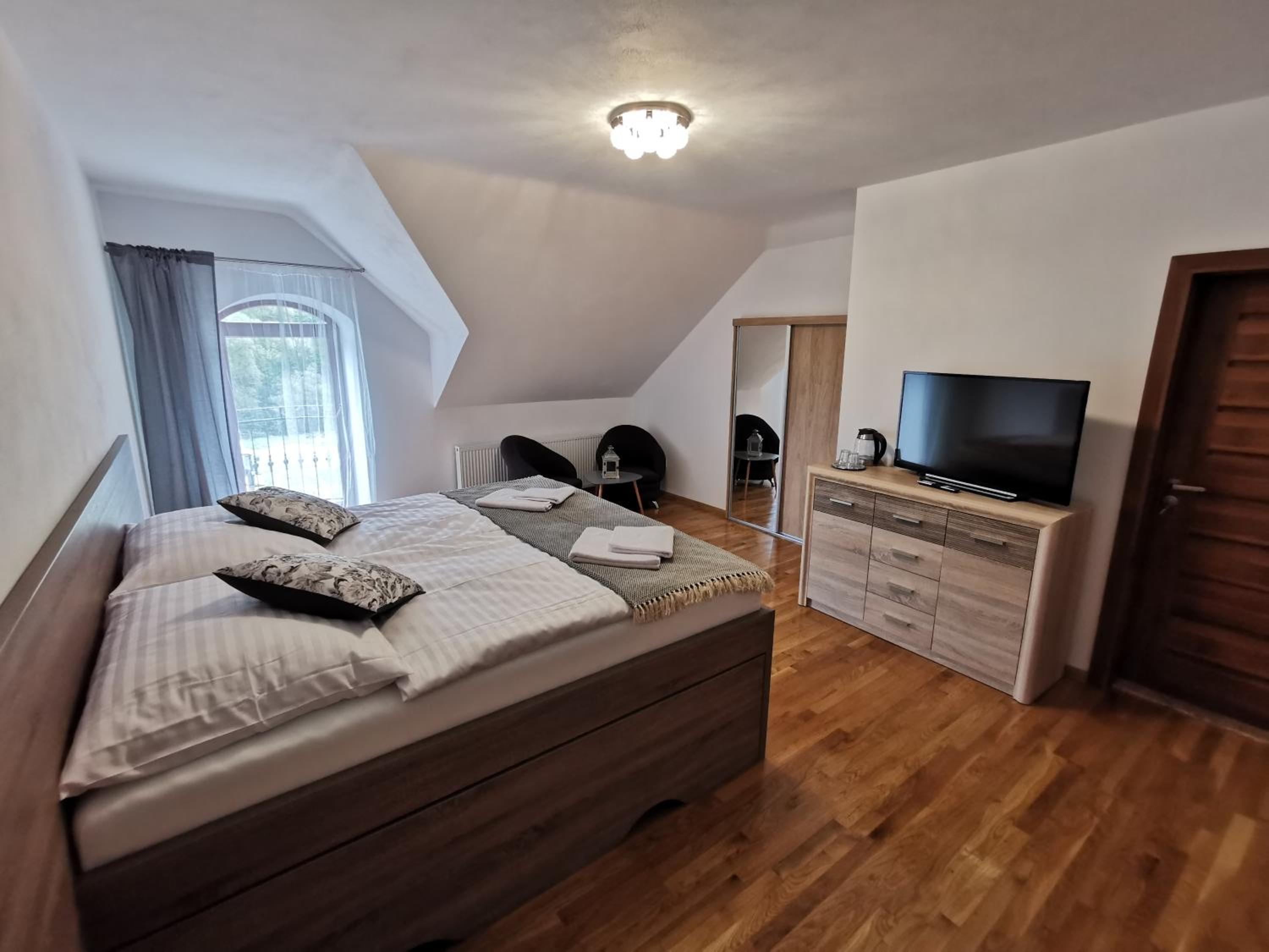 Family Room with Balcony - Photo 1