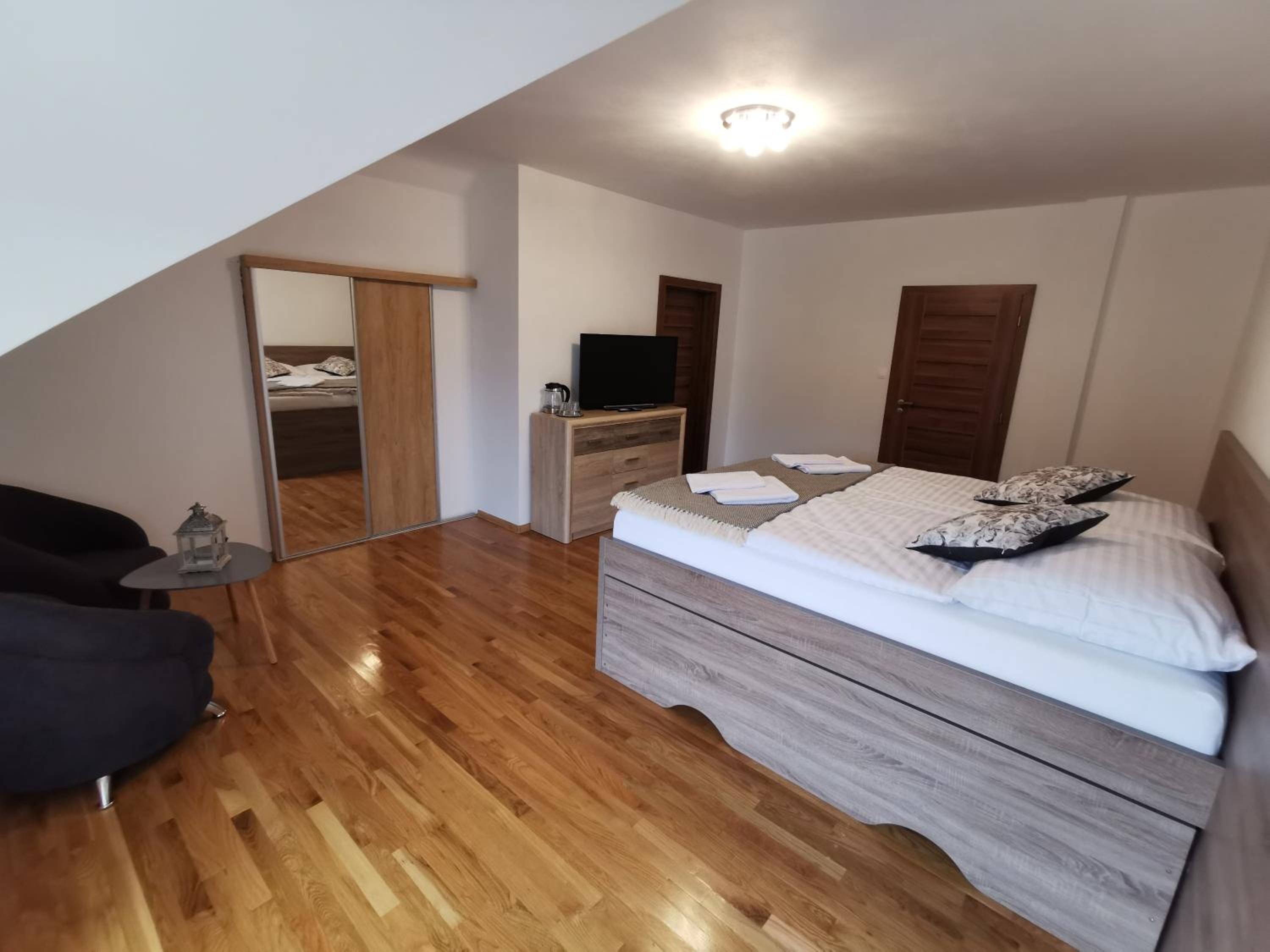 Family Room with Balcony - Photo 2