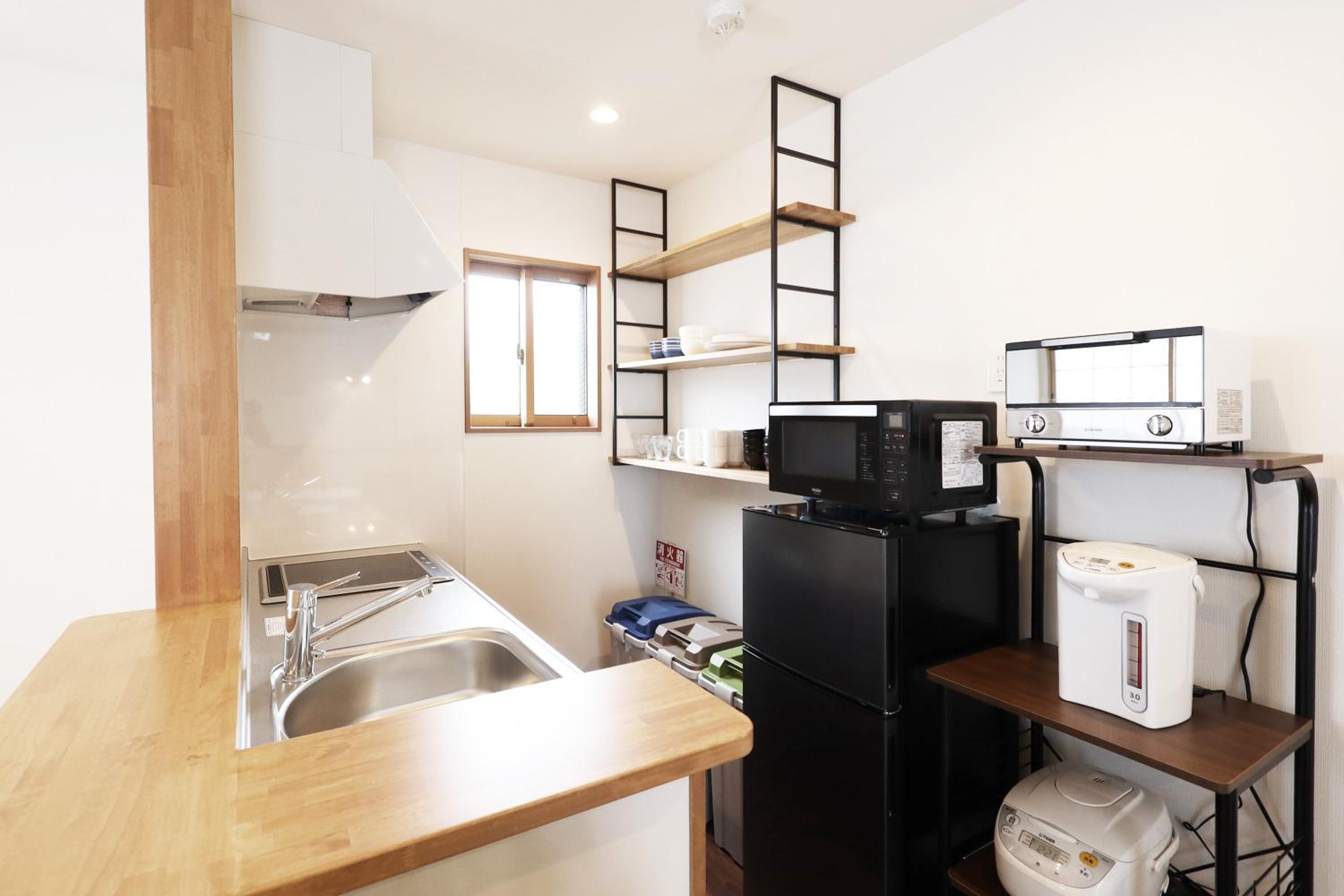 Three-Bedroom House - Photo 11