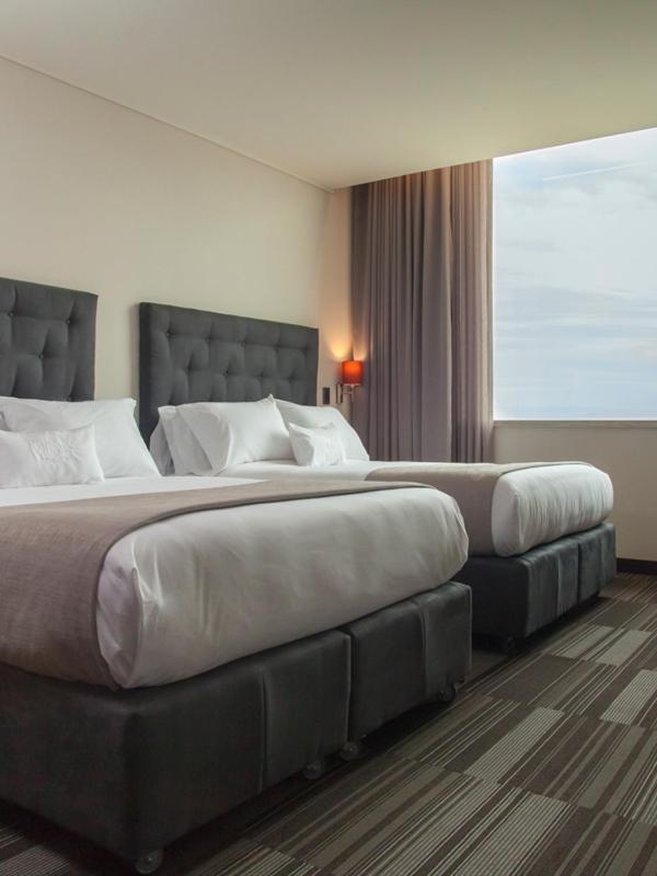 Standard Queen Room with Two Queen Beds photo 3