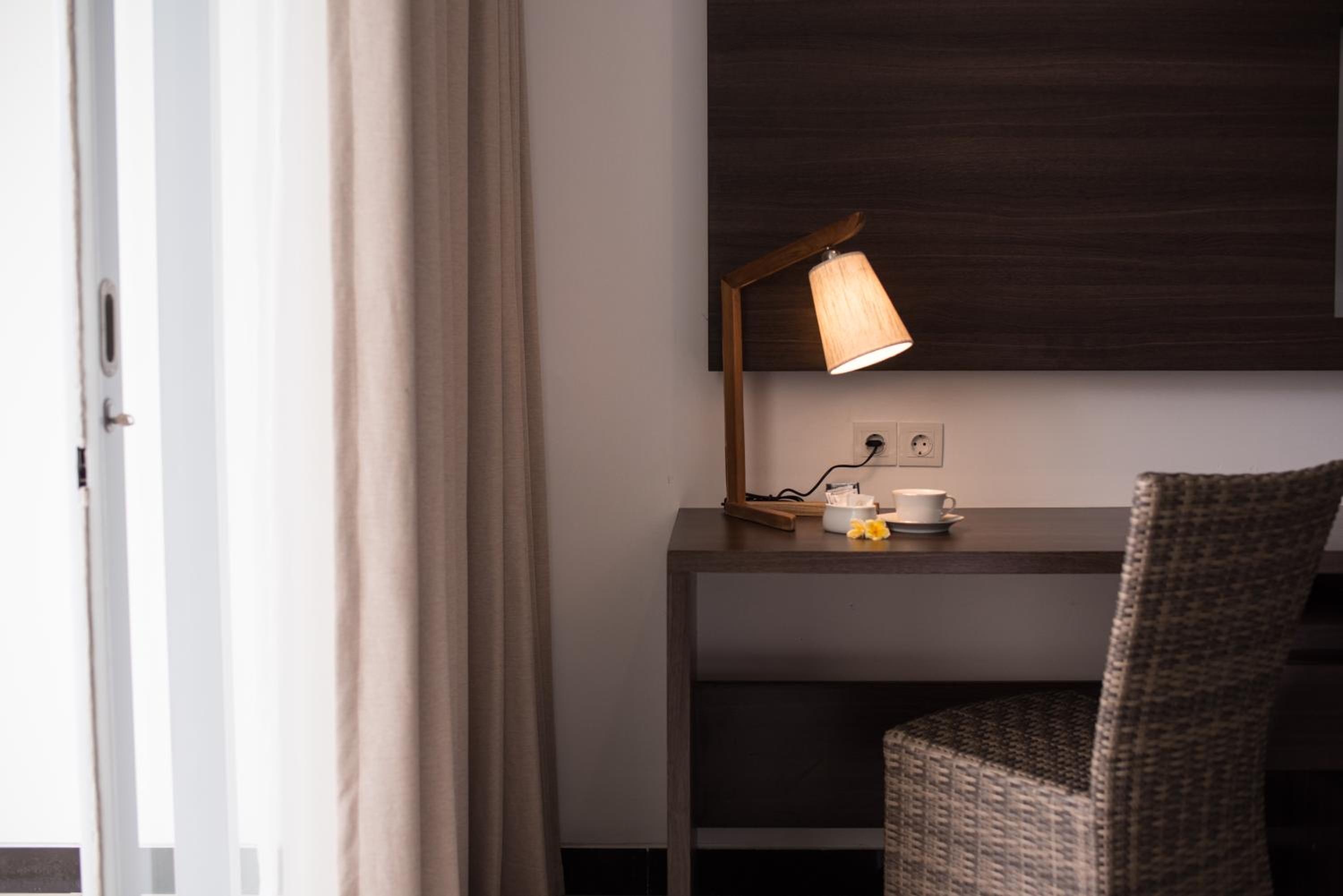 Deluxe Room with Balcony - Photo 3