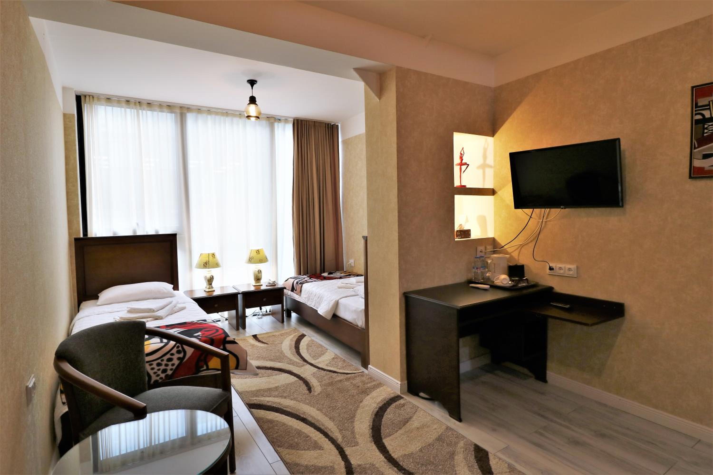 Standard Twin Room - Photo 1
