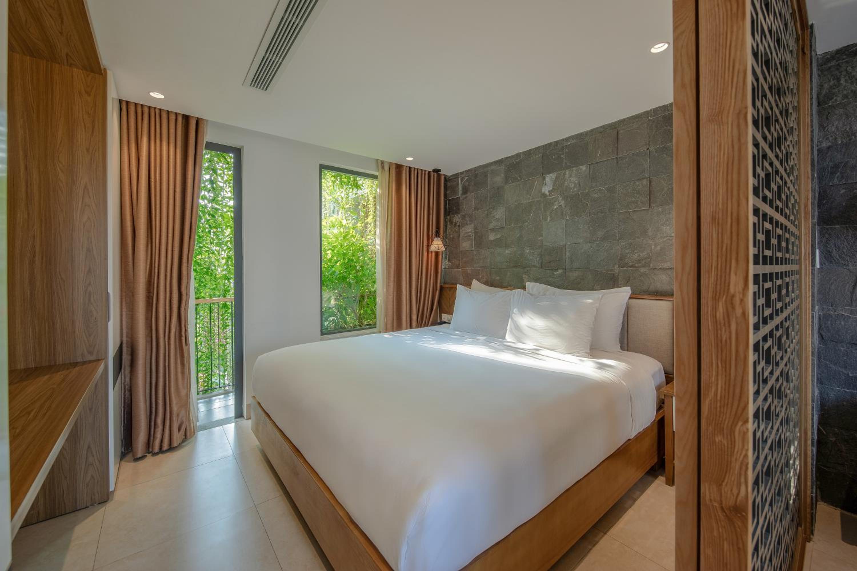 Two-Bedroom Suite with Street View and Pool View