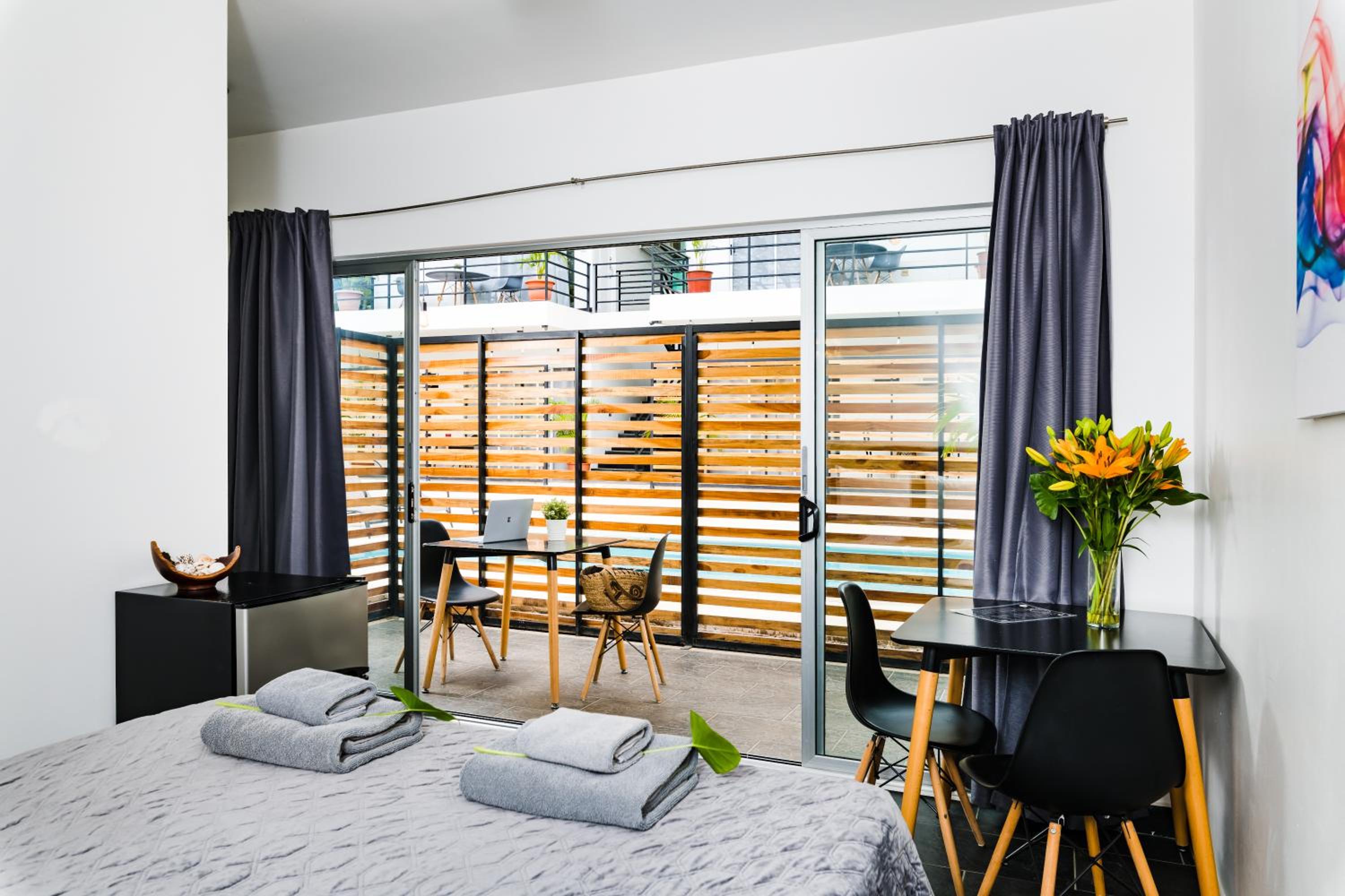 Premium Queen Room with patio and pool view