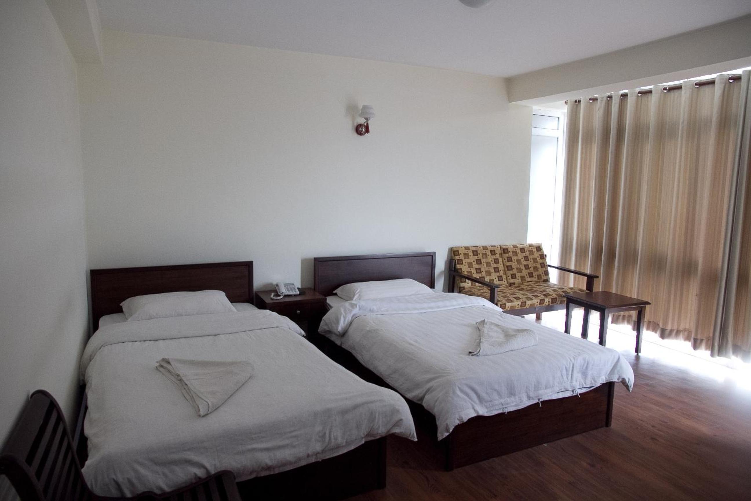 Deluxe Twin Room with Complimentary Airport Pickup for International Arrival photo 1