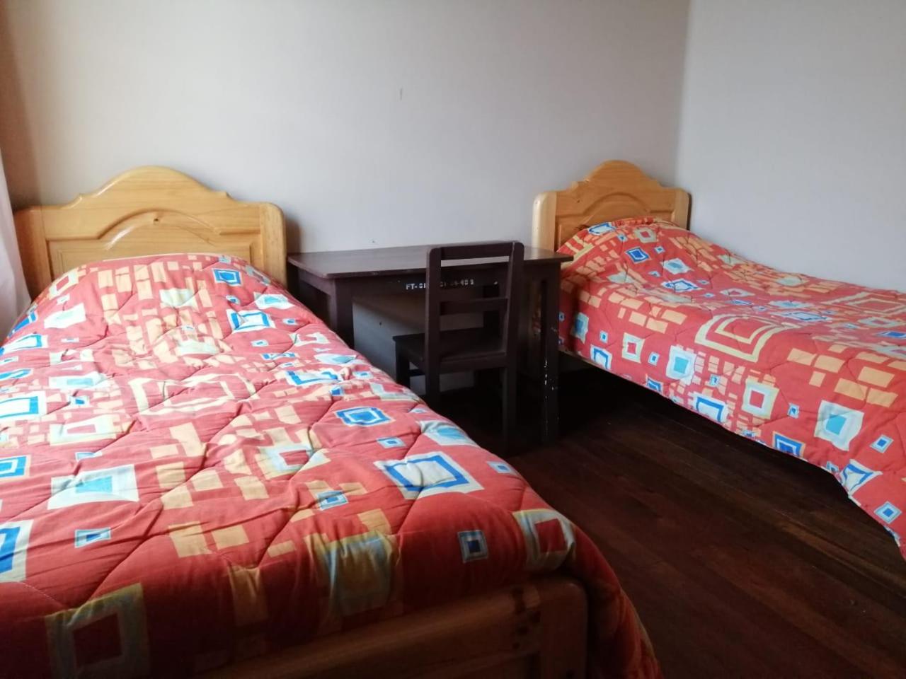 Economy Triple Room with Shared Bathroom photo 1