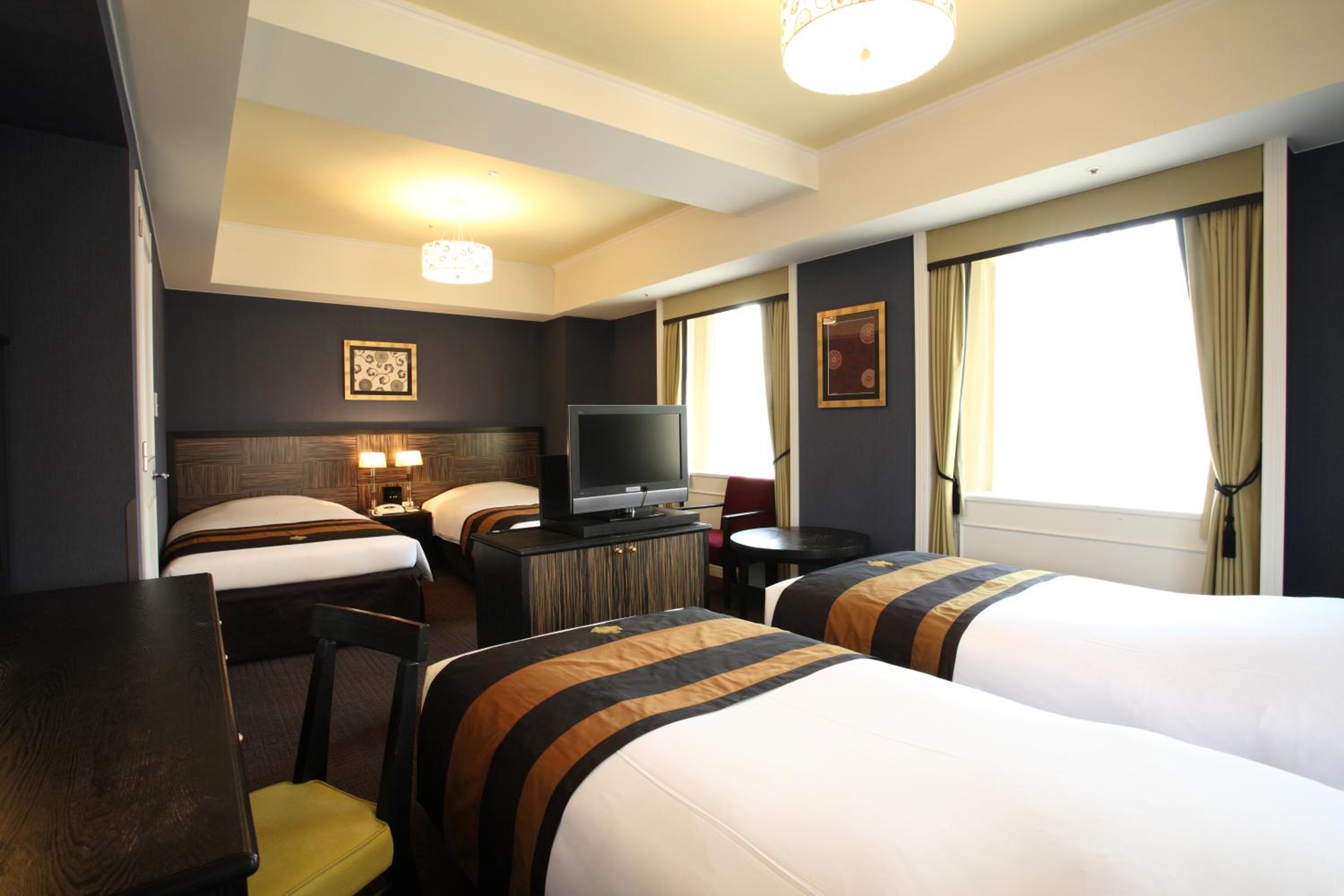 Quadruple Room with Bath - Photo 1