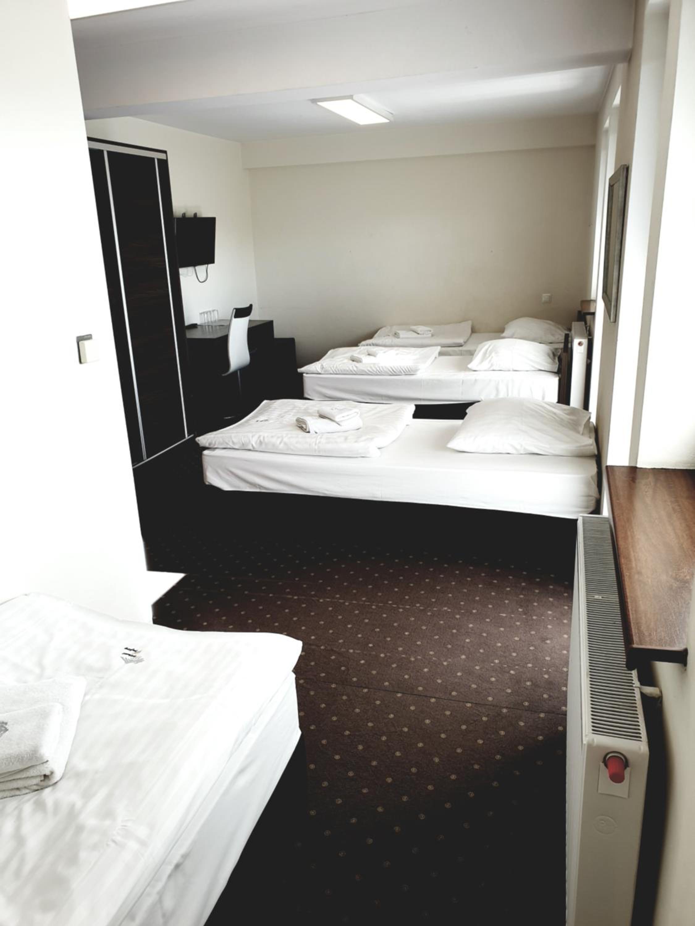 Quadruple Room with Balcony photo 1