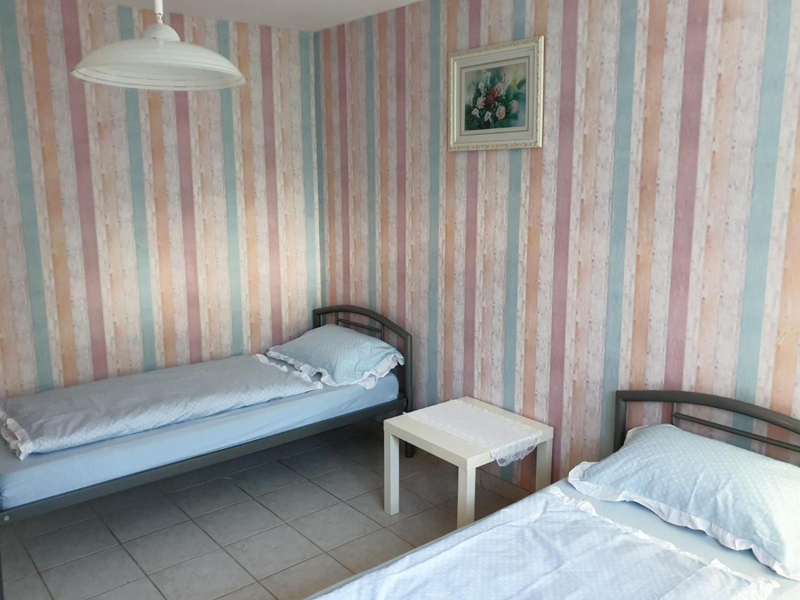 Three-Bedroom Apartment - Photo 1