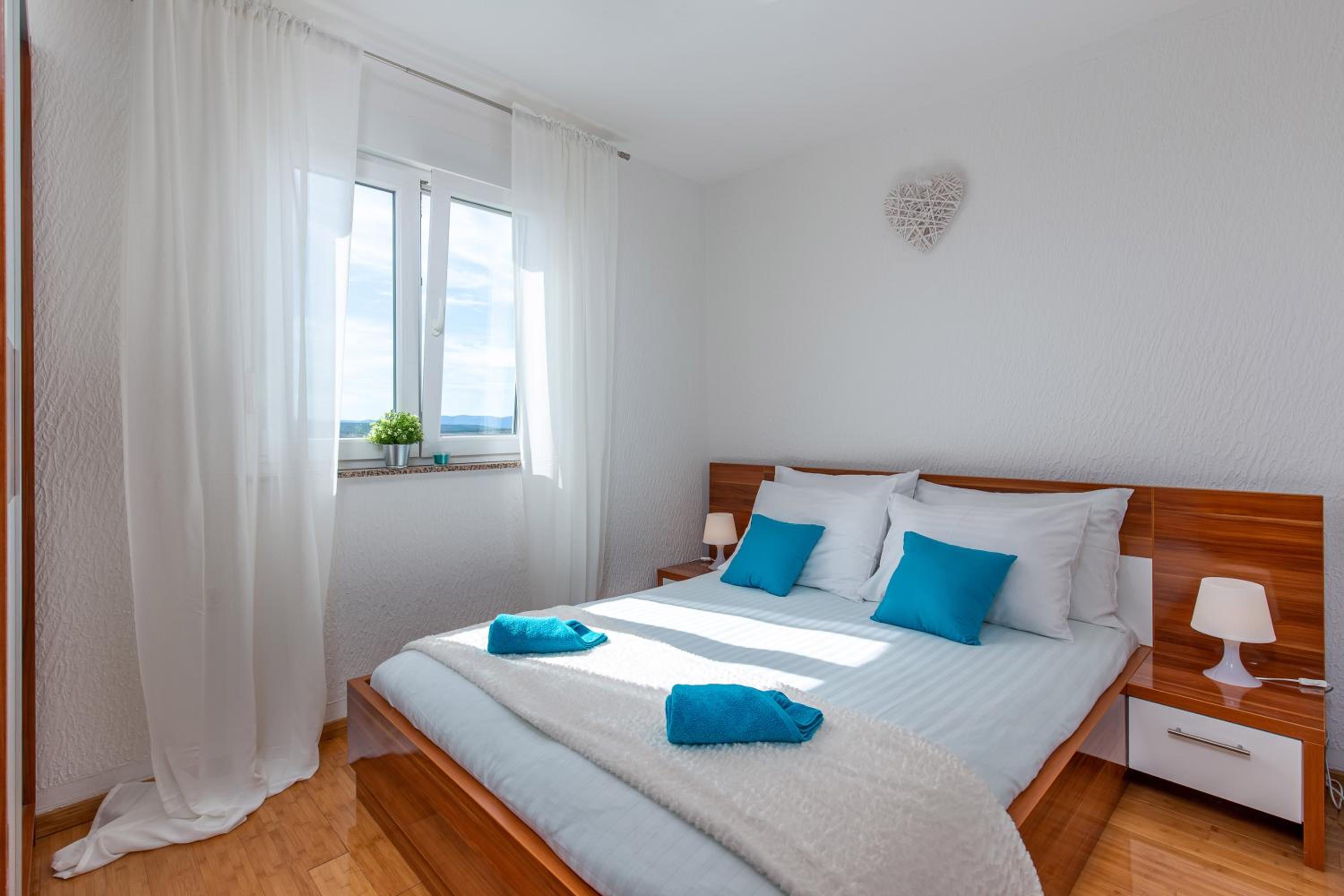 One-Bedroom Apartment with Balcony and Sea View