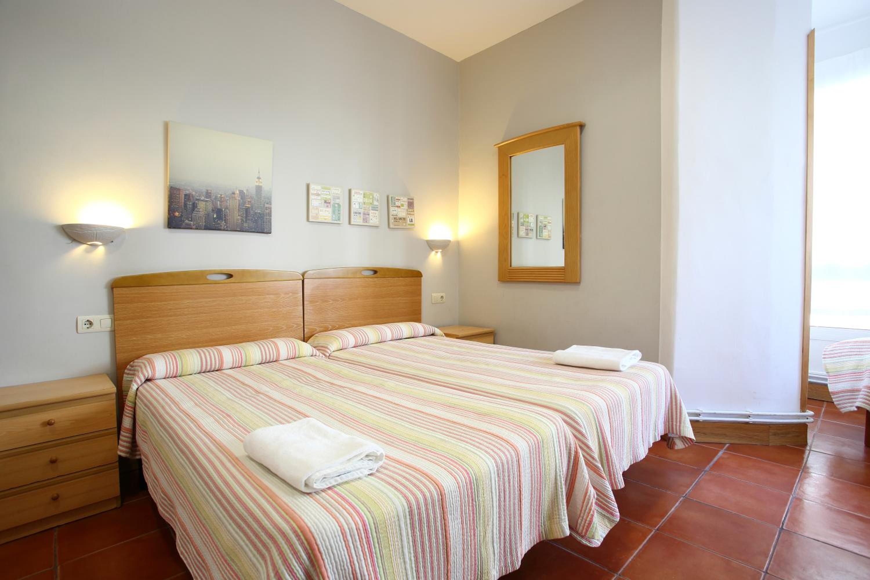 Habitación estándar para familias con baño compartido