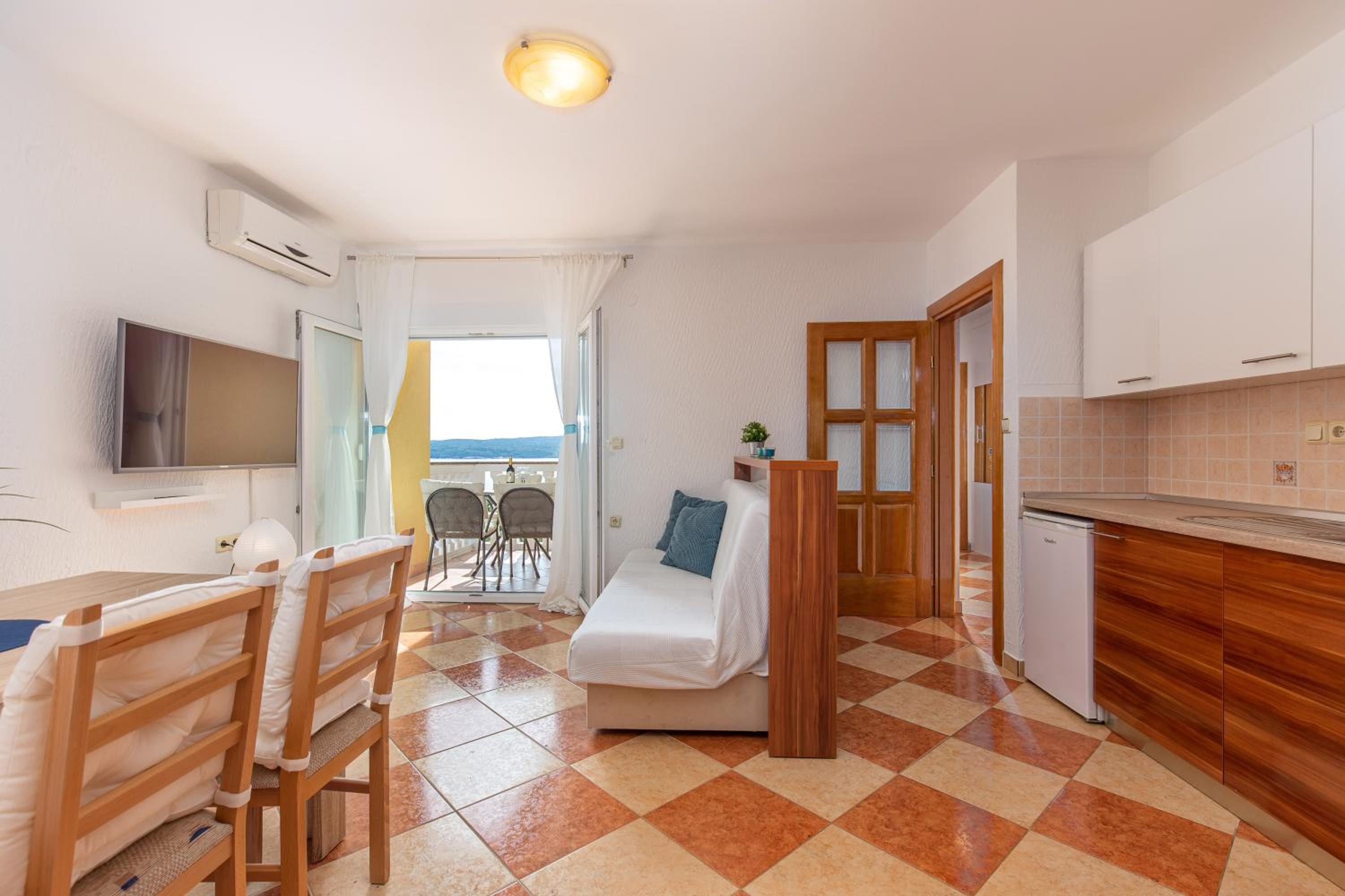 Two-Bedroom Apartment with Balcony and Sea View