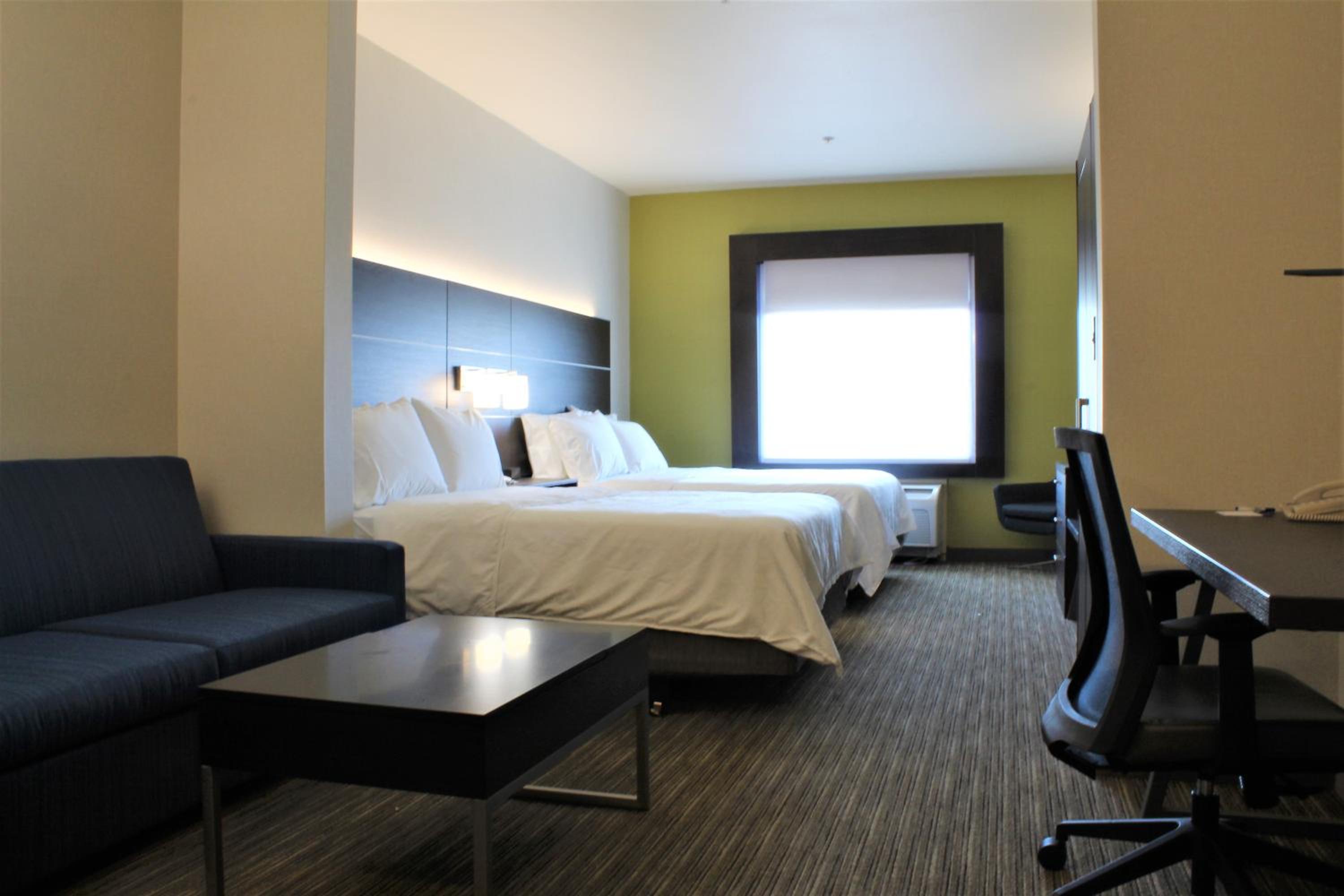 Queen Suite with Two Queen Beds and Sofa Bed - Photo 1